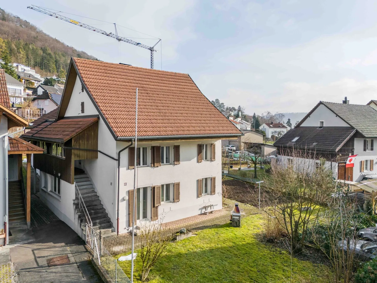 Maison résidentielle avec deux appartements de 2,5 pièces et potentiel de développement dans le centre du village calme de Remigen - Photo 26 sur 26