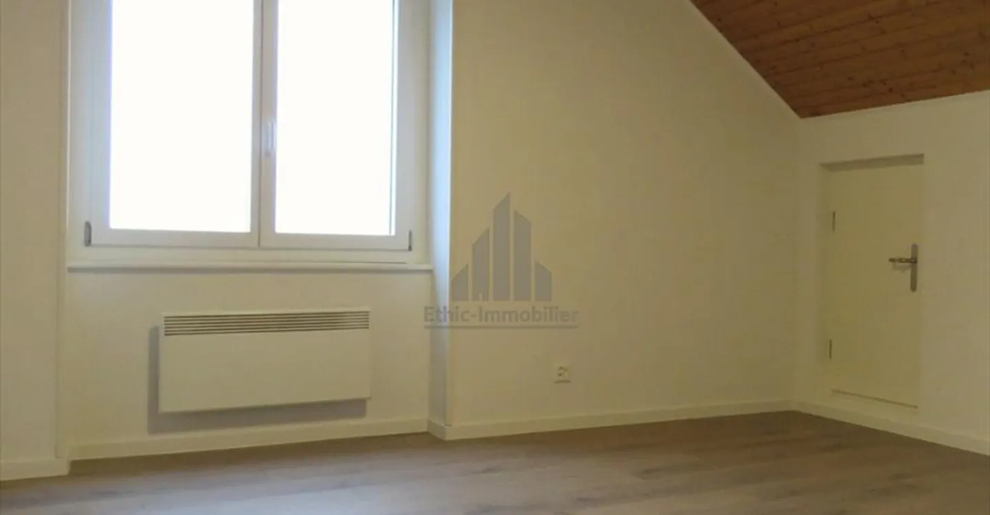 Appartement familial de 4.5 pièces en duplex  Vue lac et montagnes - Photo 11 of 12