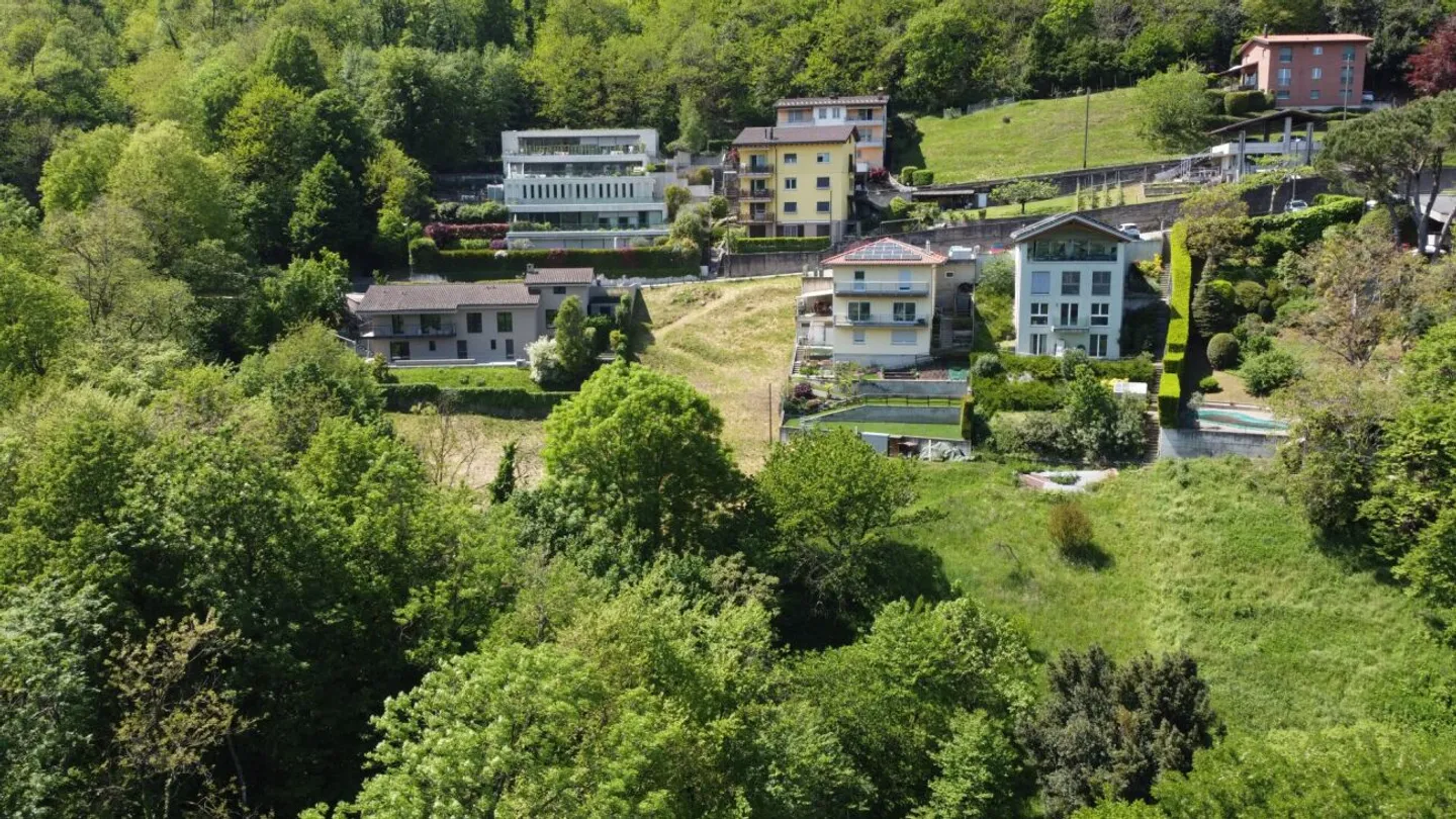 Neuer Preis! Montagnola zum Verkauf großzügiges Baugrundstück mit freier Sicht auf die Berge - Foto 5 von 6
