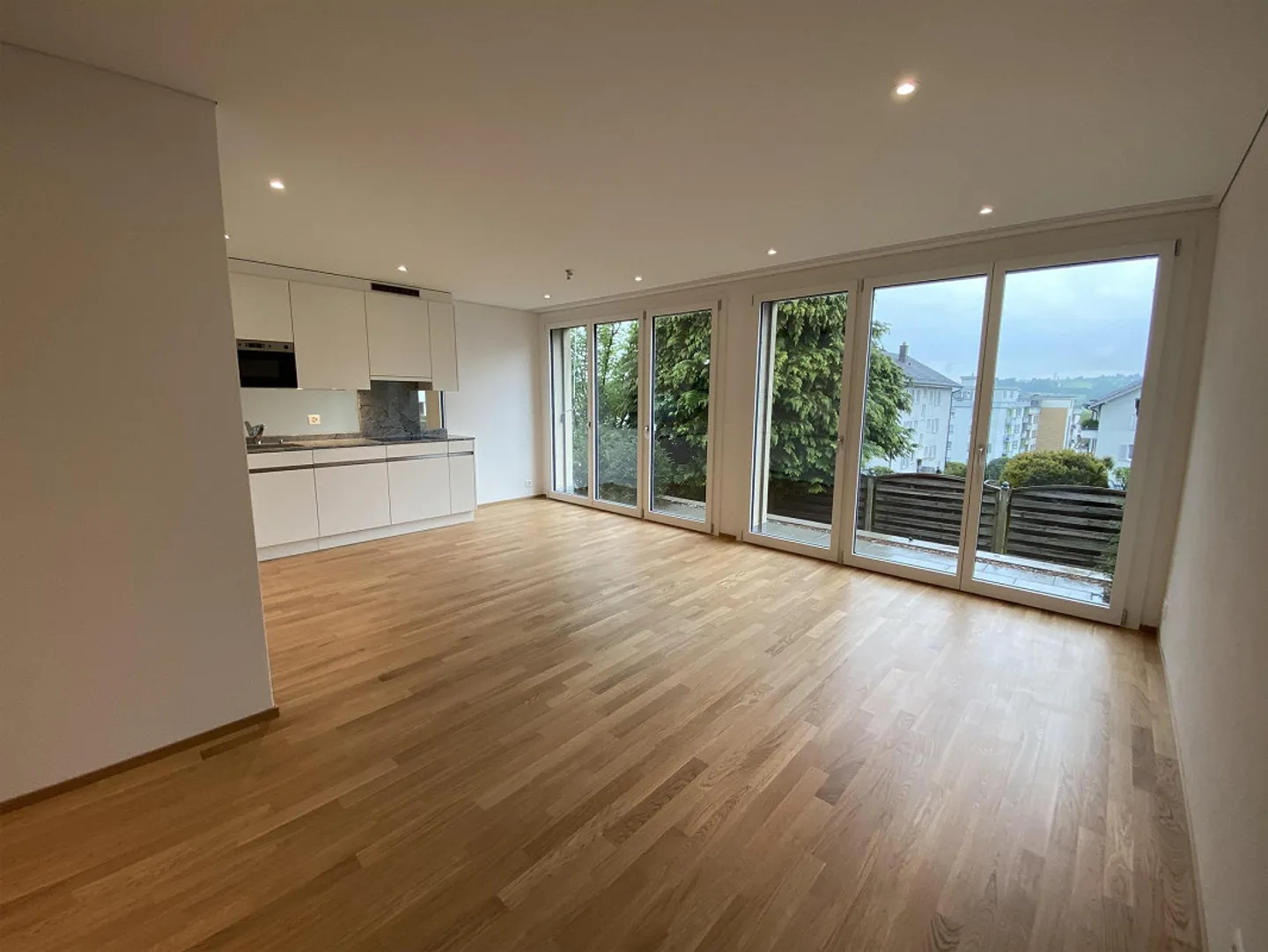 Vivre dans une maison en rangée - Photo 3 sur 8