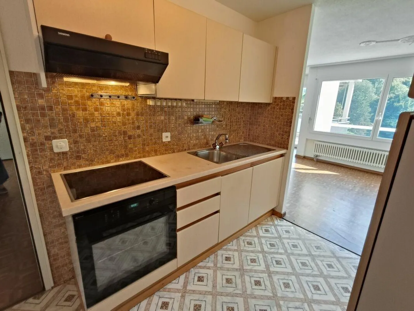 Appartement lumineux de 3,5 pièces près de la ville - Photo 5 sur 9