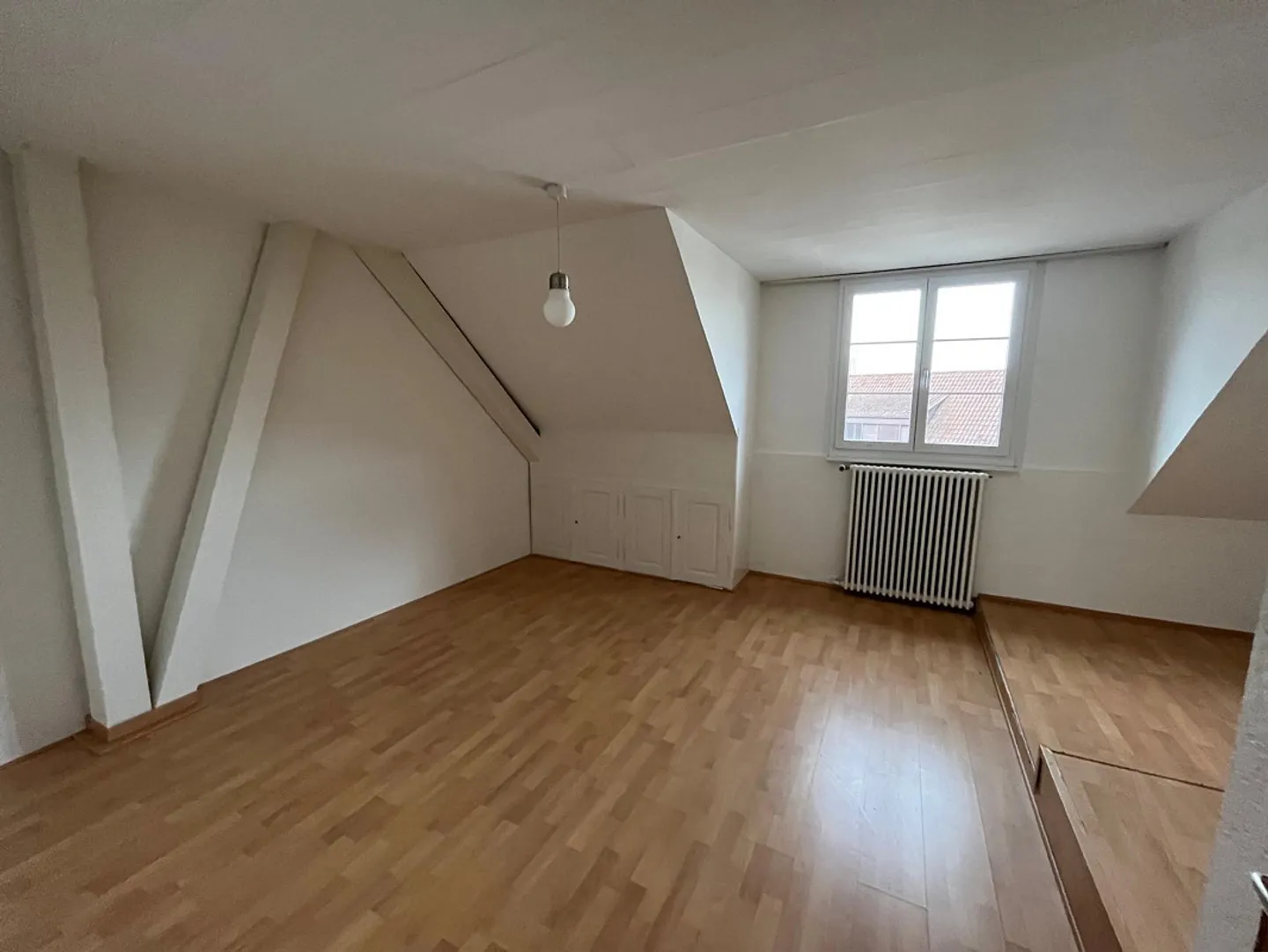 Spacious 4.5-room attic apartment in the heart of Augst - Photo 4 of 9