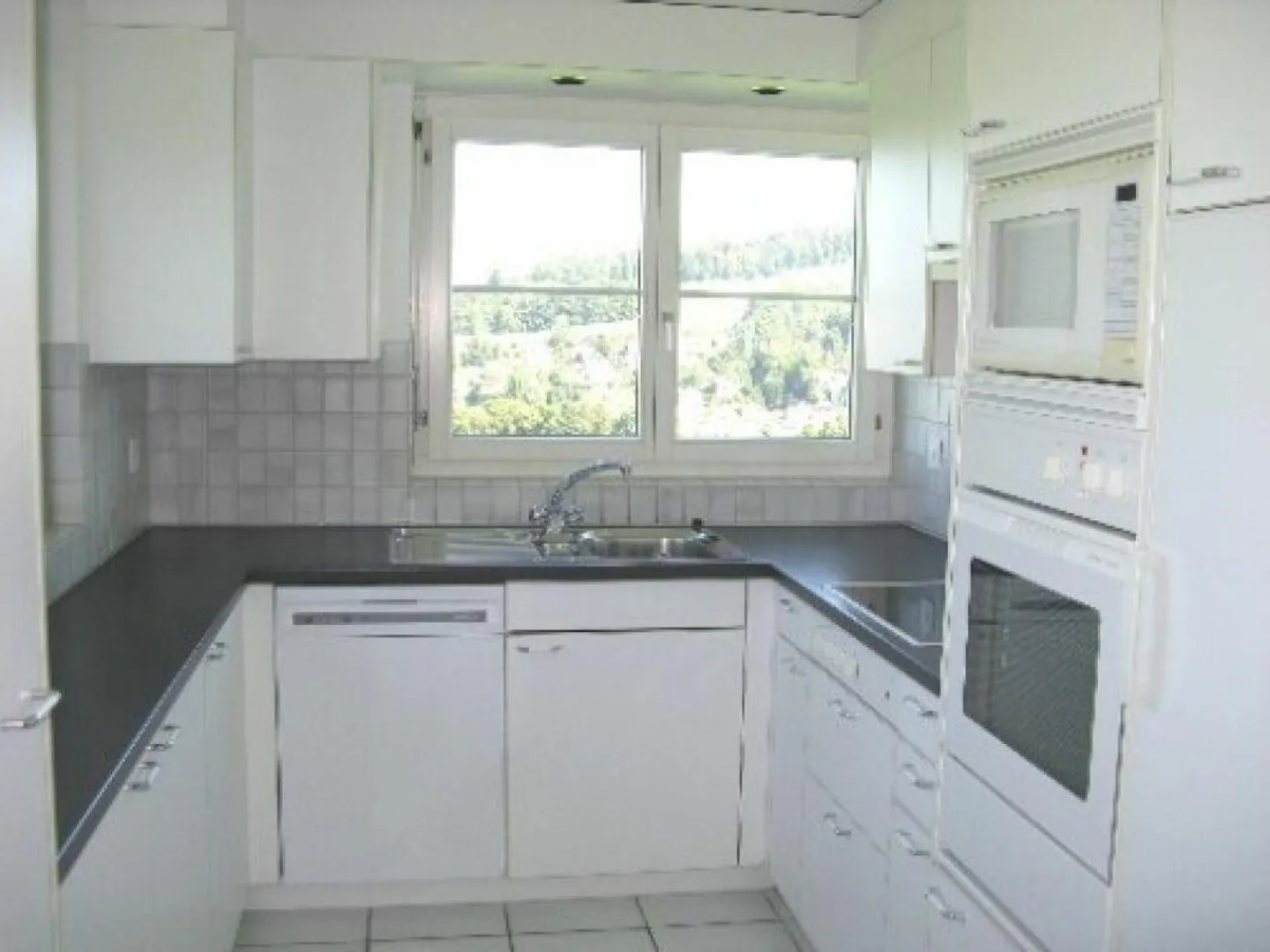 Belle appartement de 4 1/2 pièces - Photo 6 sur 13