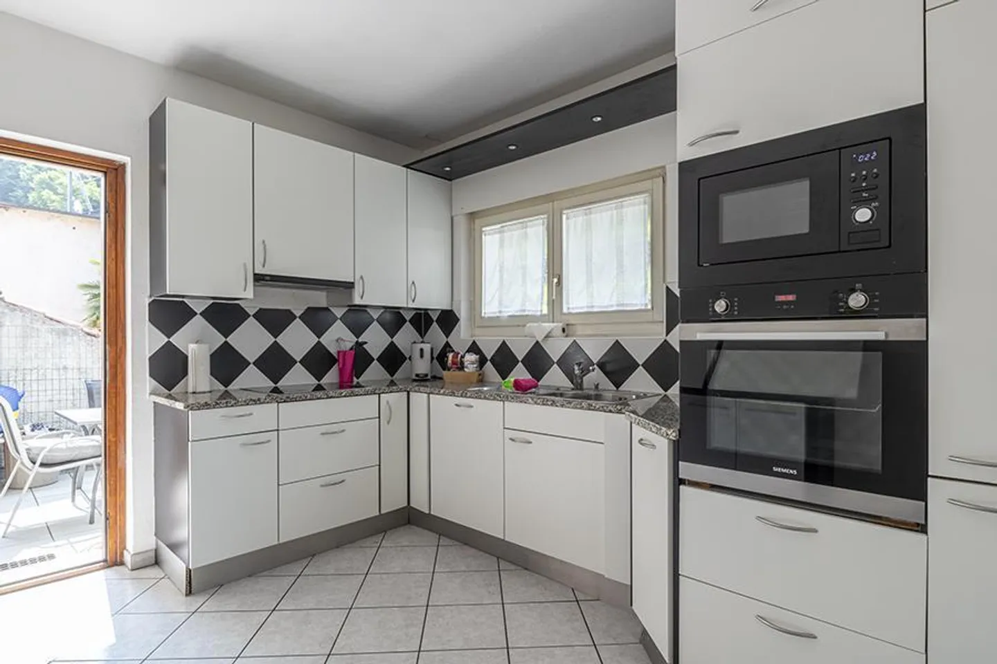 MAISON DE 5 PIÈCES À MAGADINO + APPARTEMENT DE 2,5 PIÈCES À REVENUS - Photo 1 sur 15