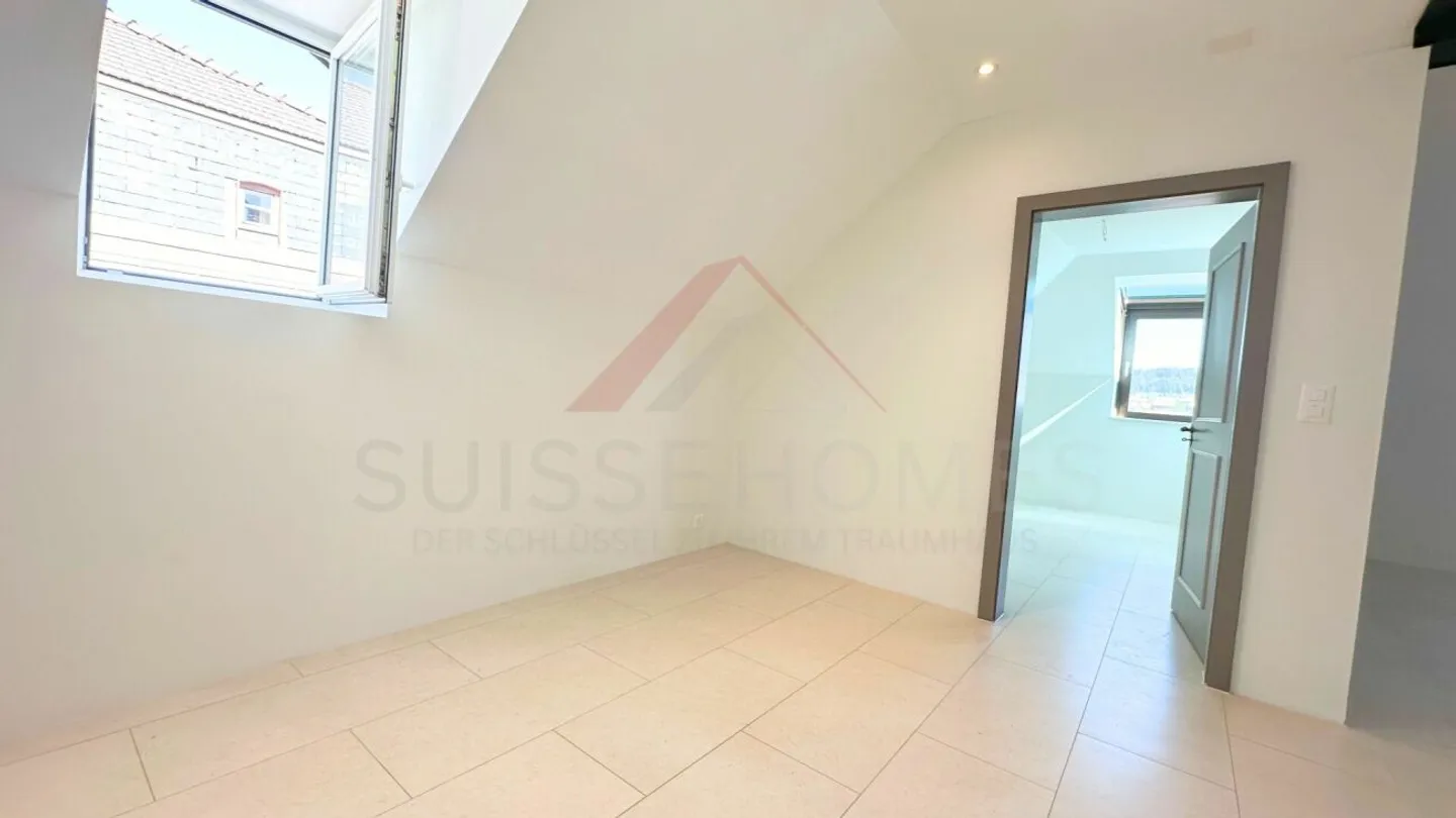 La Chaux-de-Fonds - Renovated duplex with mezzanine and unobstructed view in a mansion - Photo 6 of 11