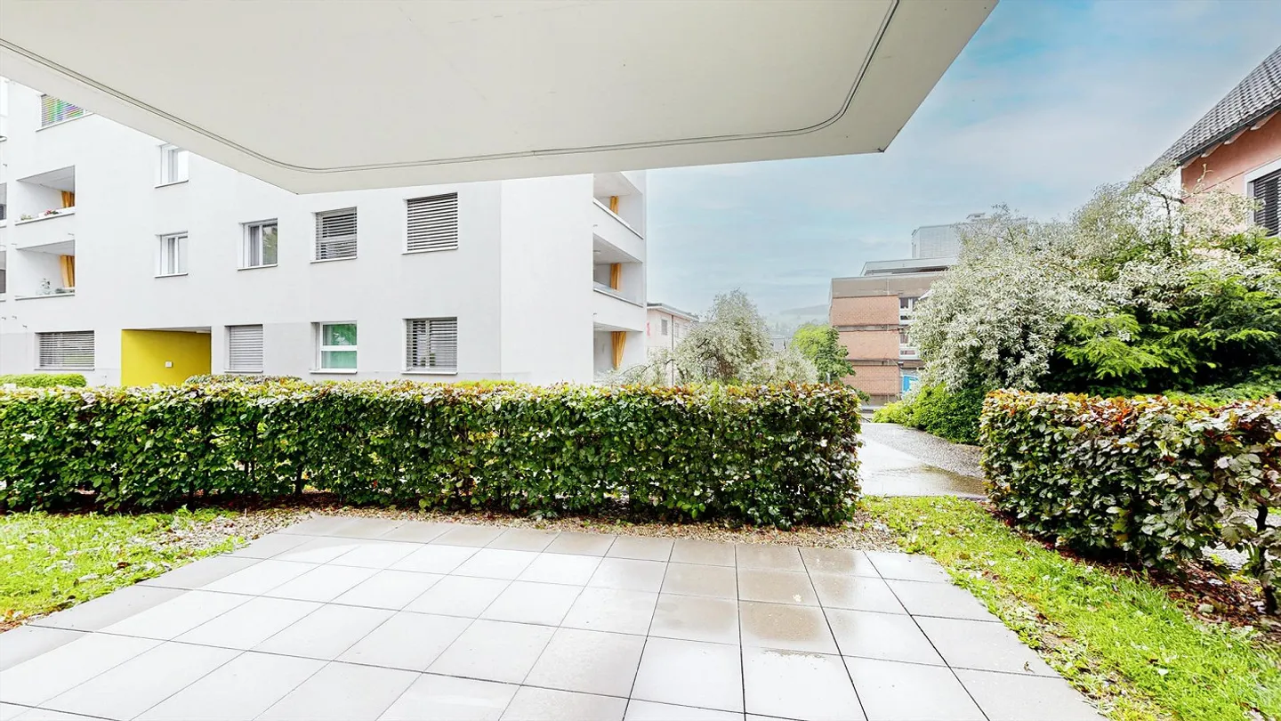 MODERN apartment with garden seating area! - Photo 11 of 13