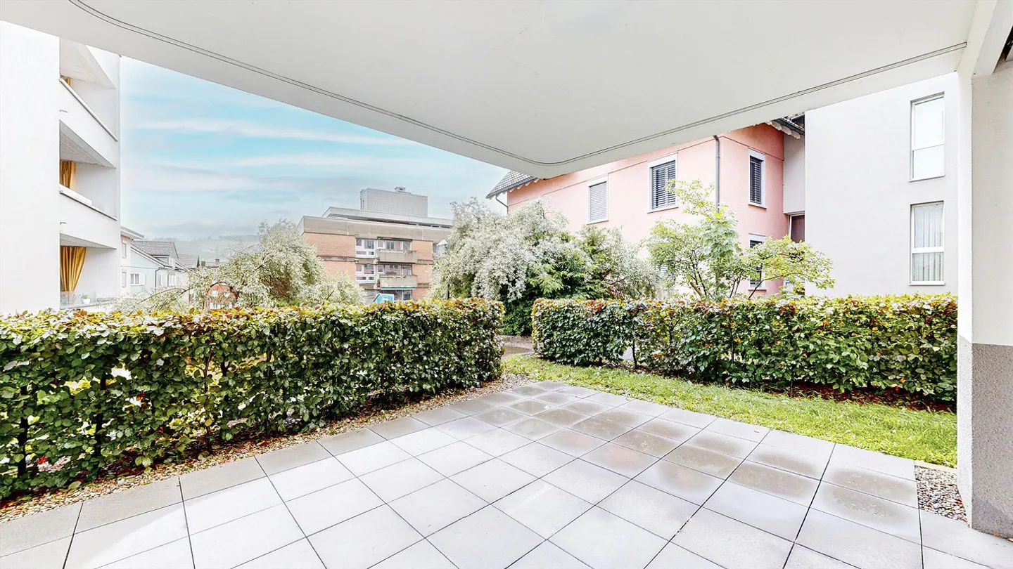 MODERN apartment with garden seating area! - Photo 12 of 13