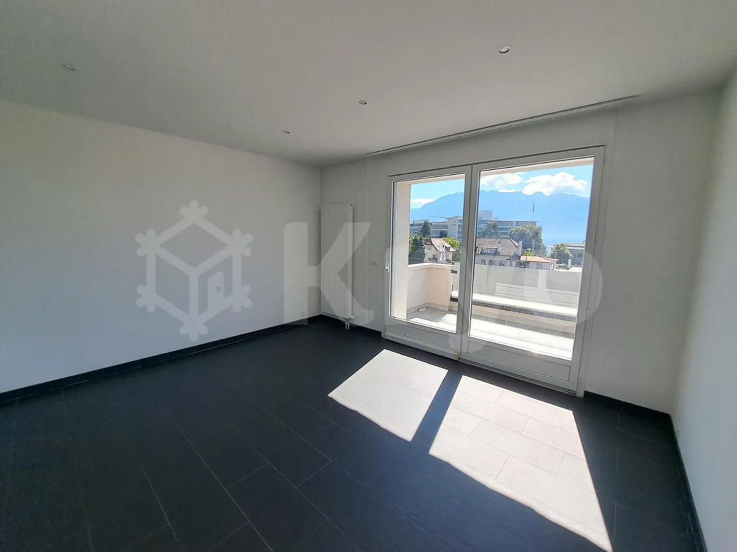 Appartement Charmant avec Vue sur le Lac - Photo 4 sur 9
