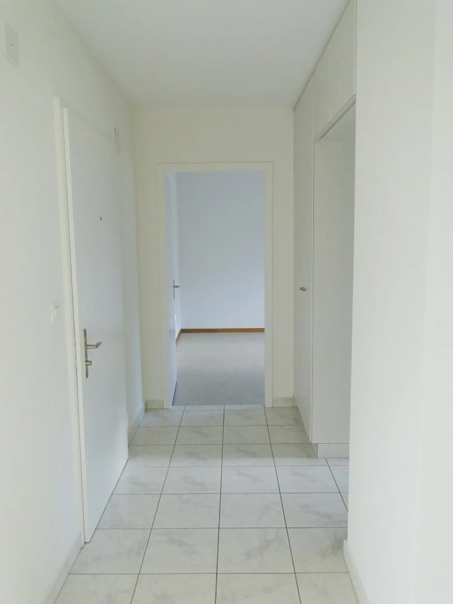 Gemütliche 2.5 Zimmer Wohnung mit Balkon und Gartensitzplatz - Foto 3 von 7