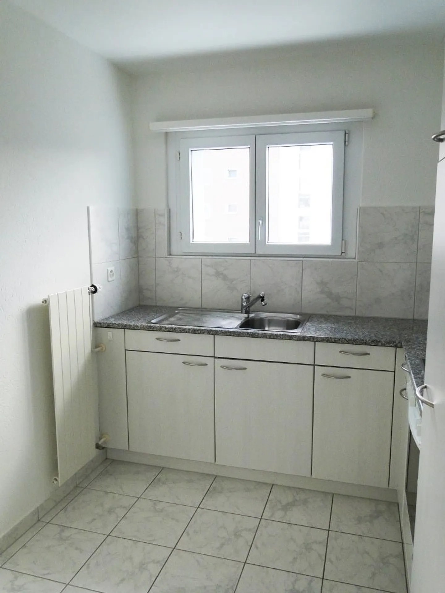 Gemütliche 2.5 Zimmer Wohnung mit Balkon und Gartensitzplatz - Foto 5 von 7