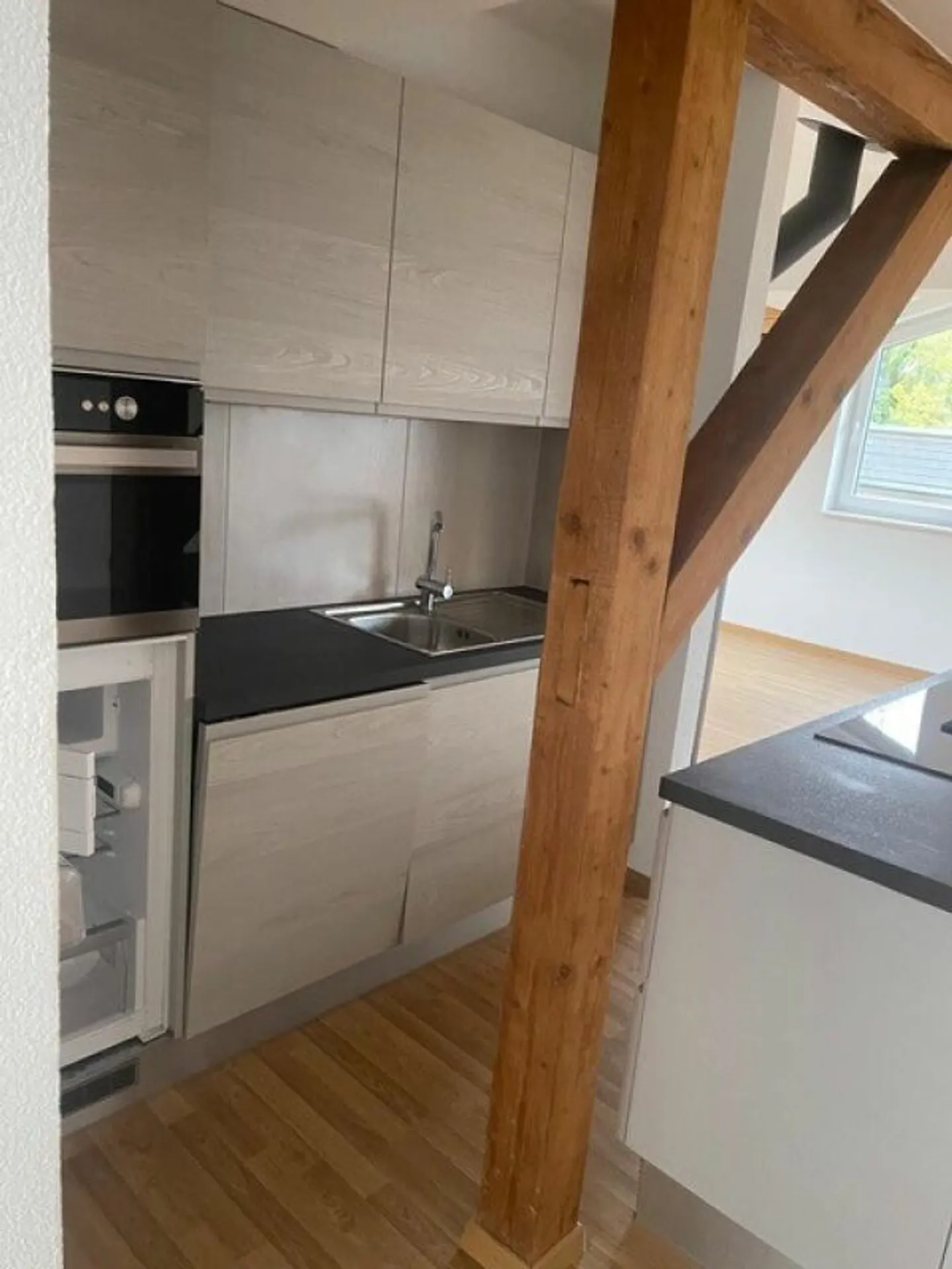 Charmante moderne Dachwohnung - Foto 3 von 9