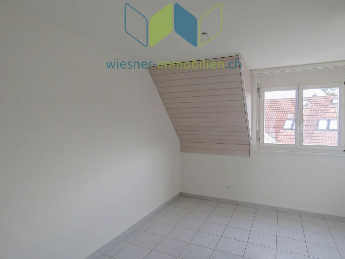 LIVING ABOVE THE ROOFS OF MÖHLIN - Photo 9 of 13
