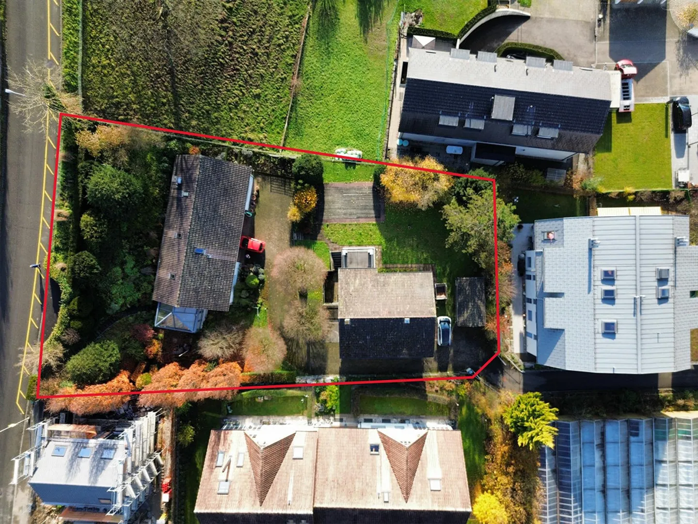 Baulandparzelle mit zwei Wohnhäuser – vielseitig nutzbar - Foto 1 von 5