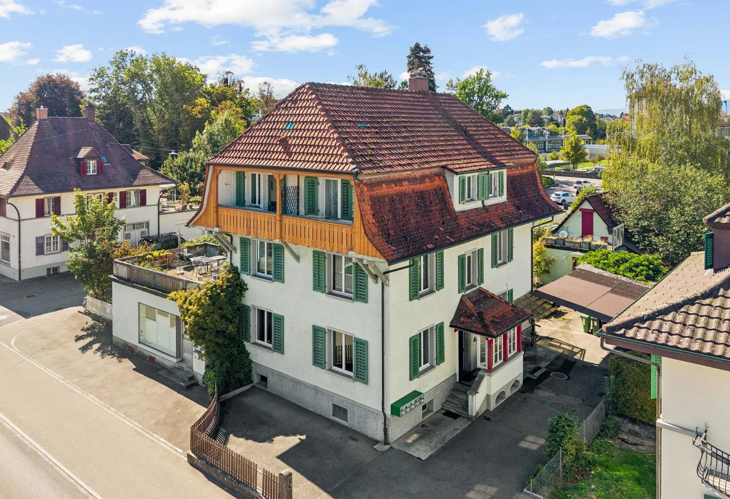 A House with History - Three-Family House with Studio and Retail Space - Photo 1 of 21