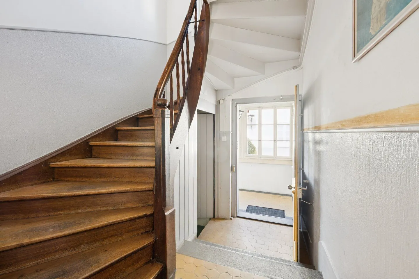 A House with History - Three-Family House with Studio and Retail Space - Photo 5 of 21
