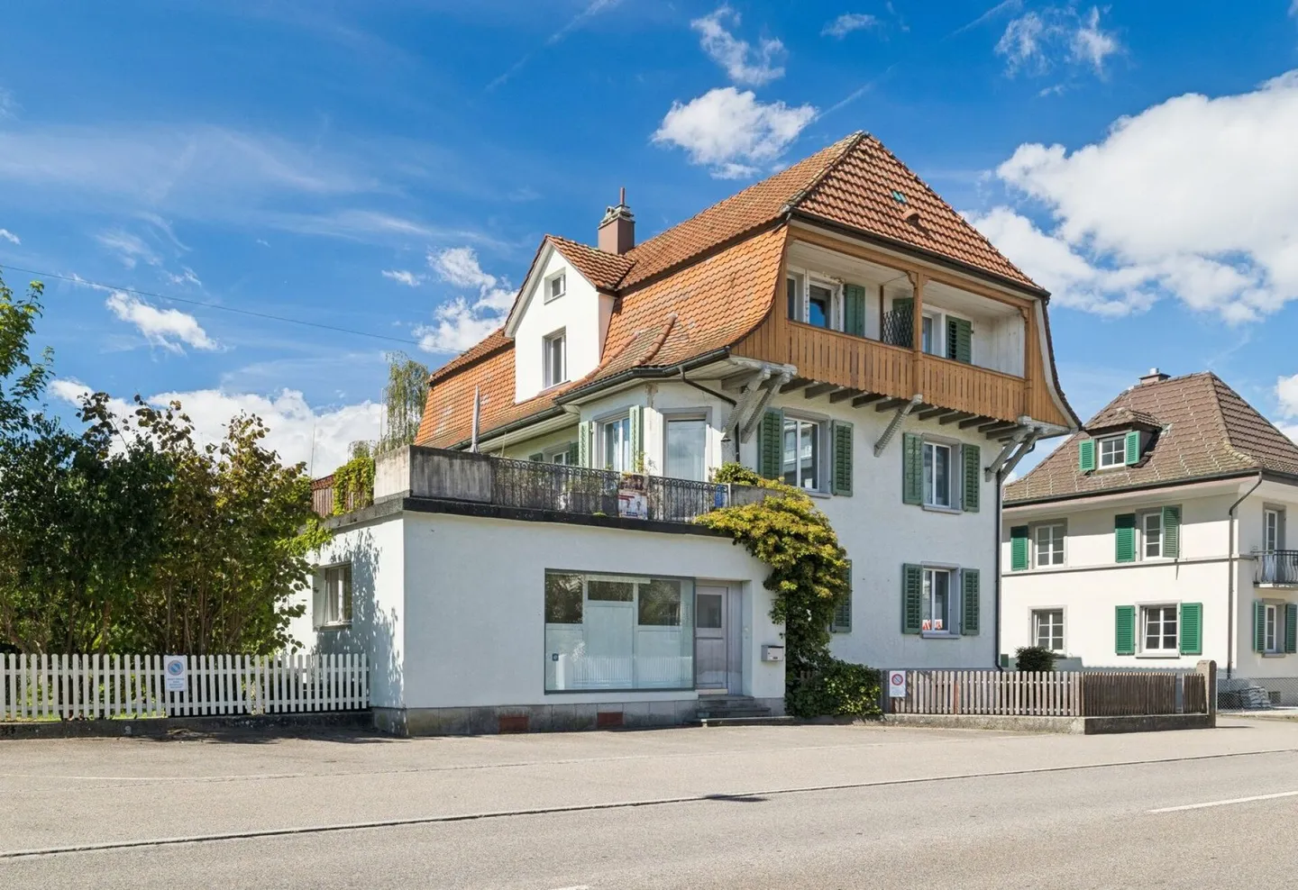 A House with History - Three-Family House with Studio and Retail Space - Photo 2 of 21