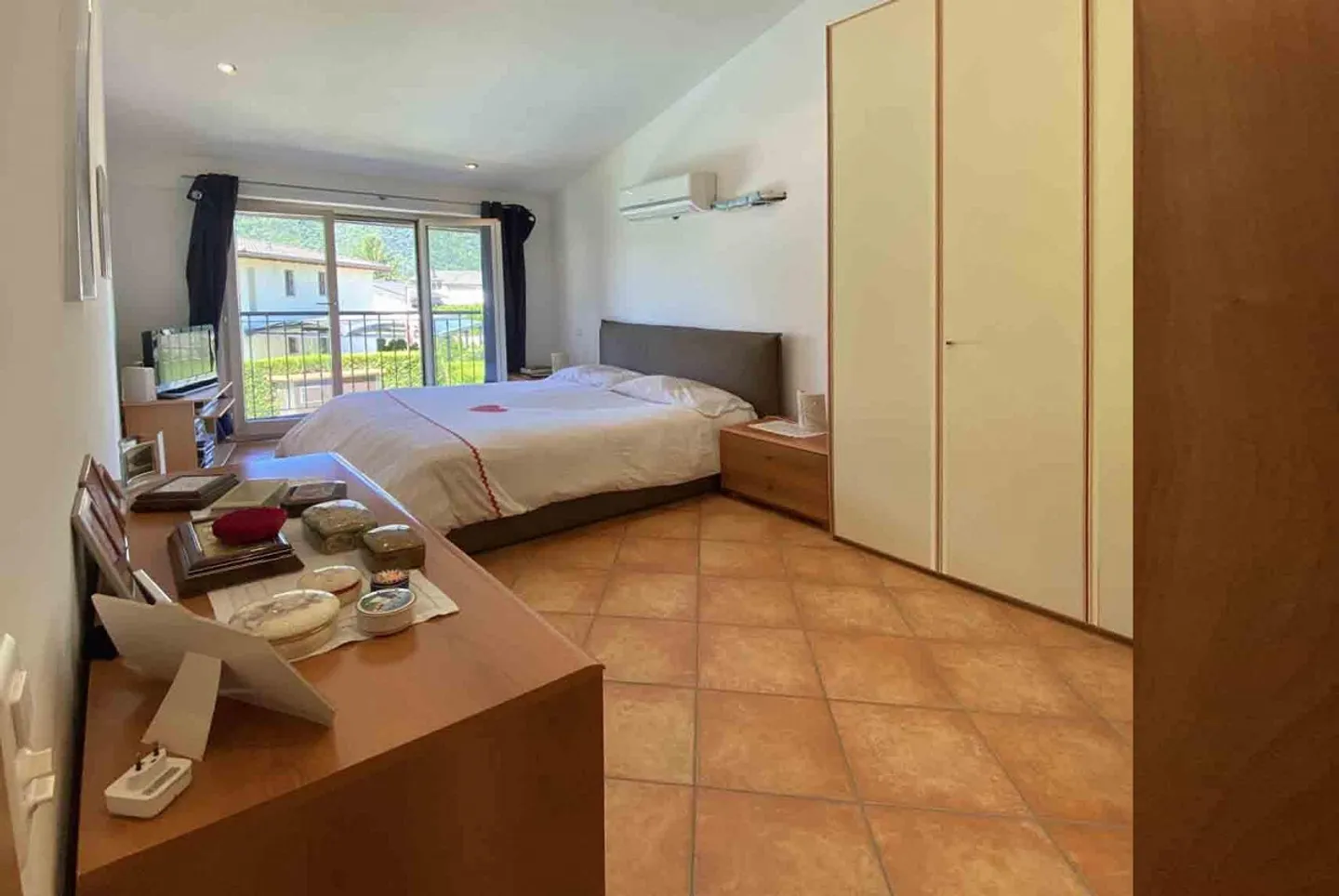 Maison bifamiliale avec piscine et grand terrain à Melano - Photo 7 sur 12