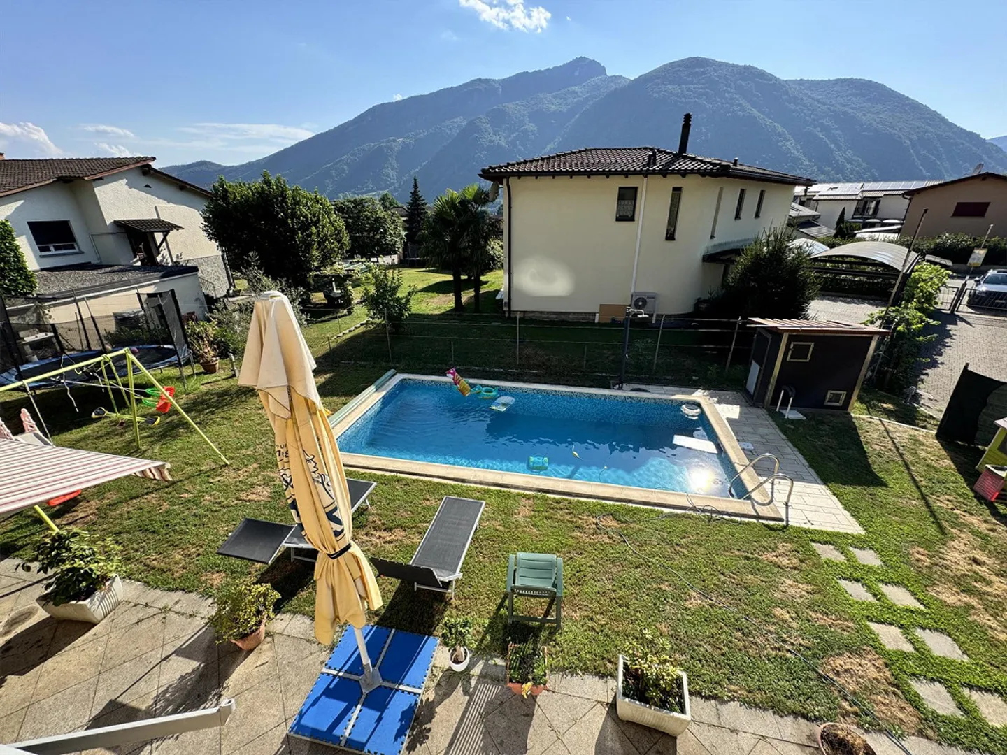 Maison bifamiliale avec piscine et grand terrain à Melano - Photo 8 sur 12