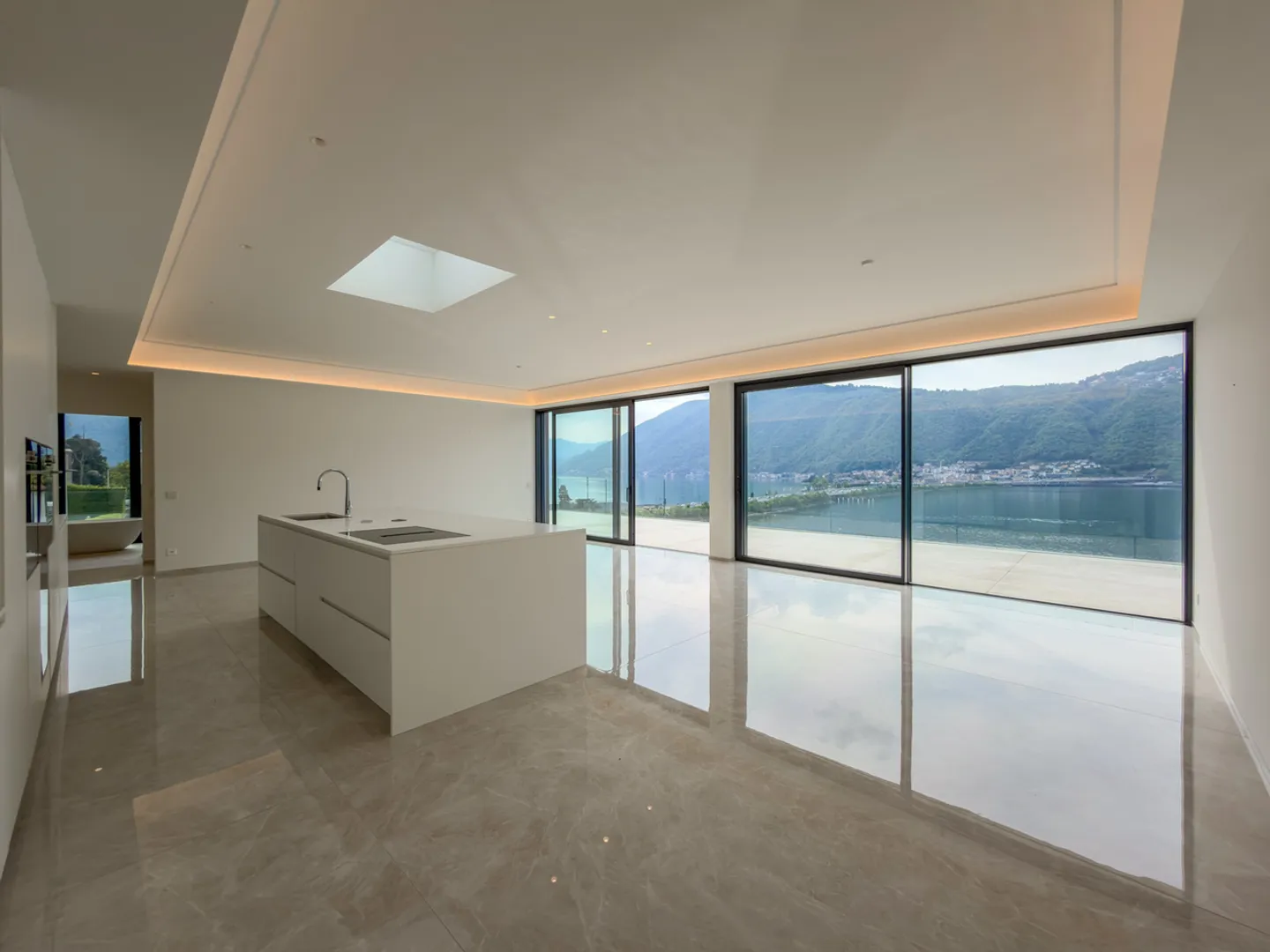 Penthouse spacieux avec magnifique terrasse vue sur le lac à Bissone - Photo 4 sur 19