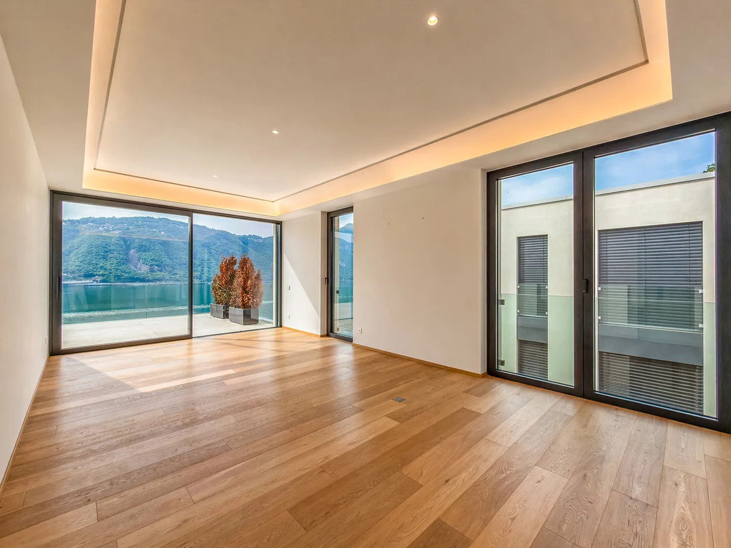 Penthouse spacieux avec magnifique terrasse vue sur le lac à Bissone - Photo 6 sur 19