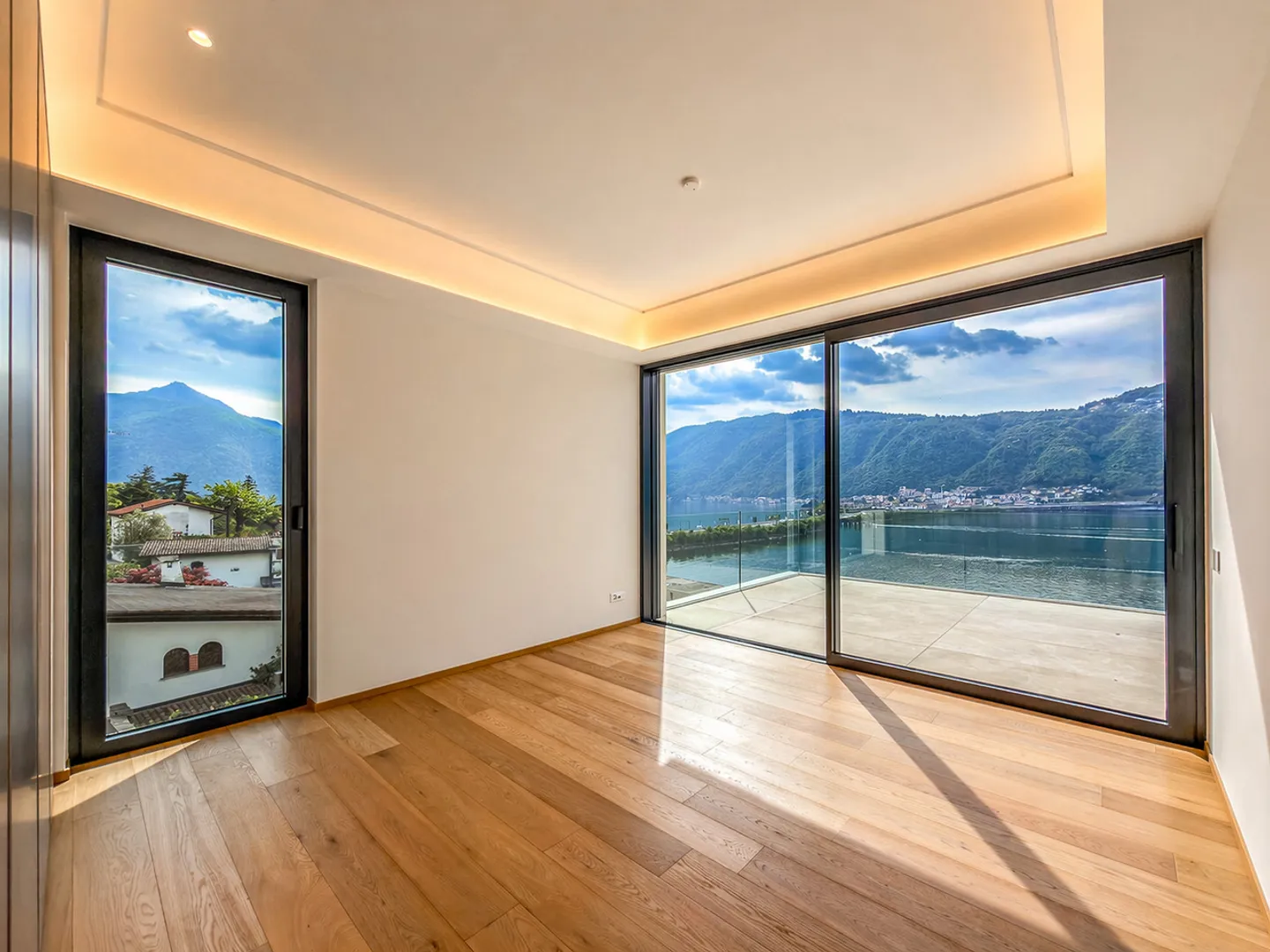 Penthouse spacieux avec magnifique terrasse vue sur le lac à Bissone - Photo 9 sur 19