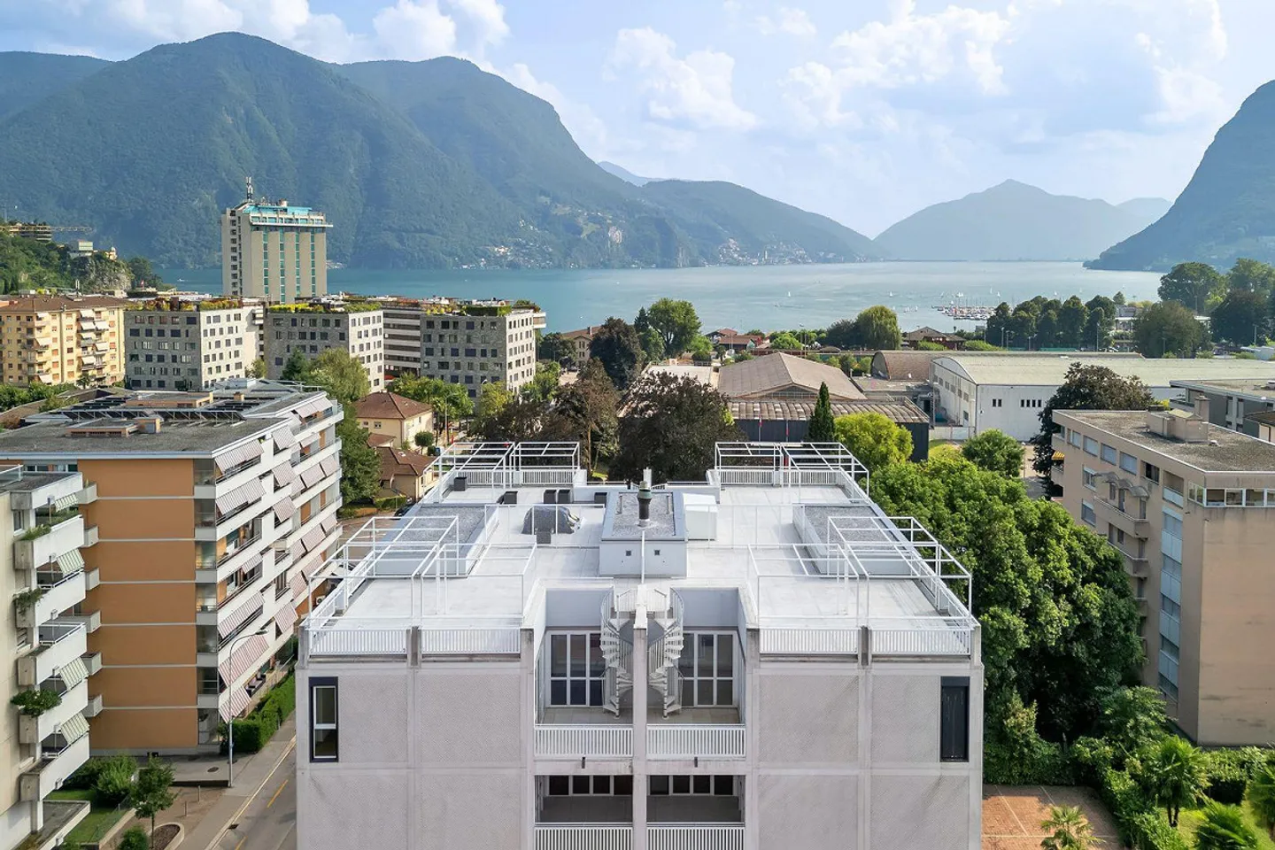 DUPLEX PENTHOUSE WITH ROOF TERRACE AND LAKE VIEWS - Photo 1 of 13