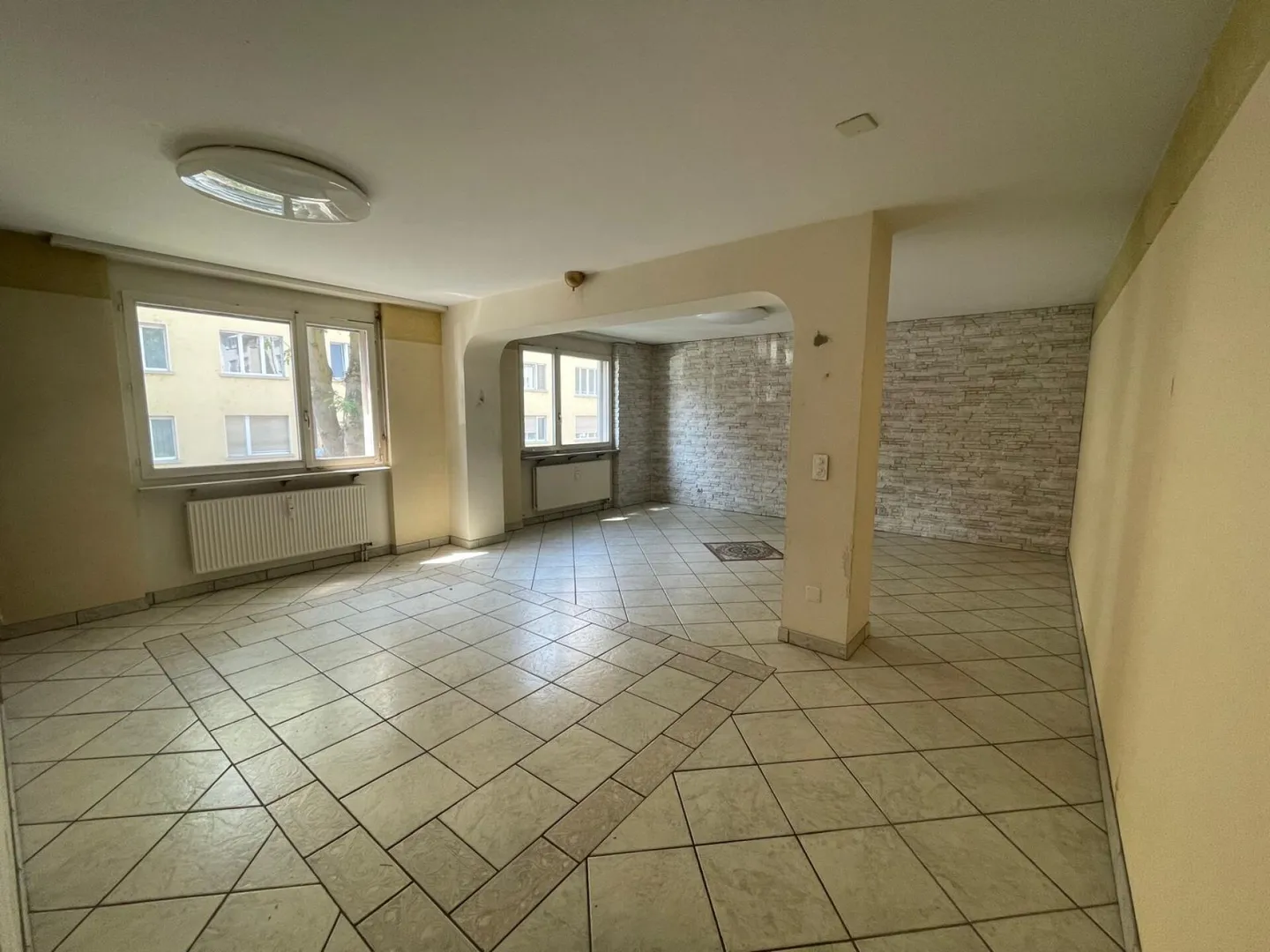 Vivre dans un quartier résidentiel central et populaire - Photo 7 sur 11