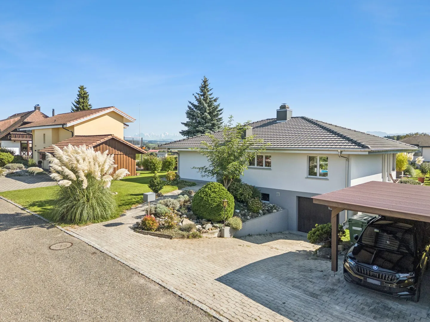 Elegante casa unifamiliare di 5,5 stanze con paradiso del giardino e vista sulle Alpi - Foto 14 di 14