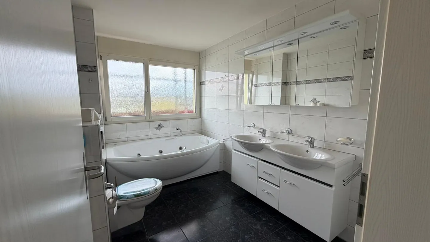 Condominium avec un grand potentiel - Photo 7 sur 8