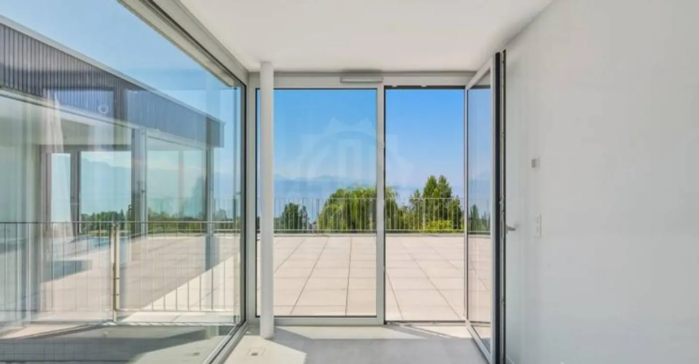 Villa contemporaine avec vue sur le lac - Photo 4 sur 11