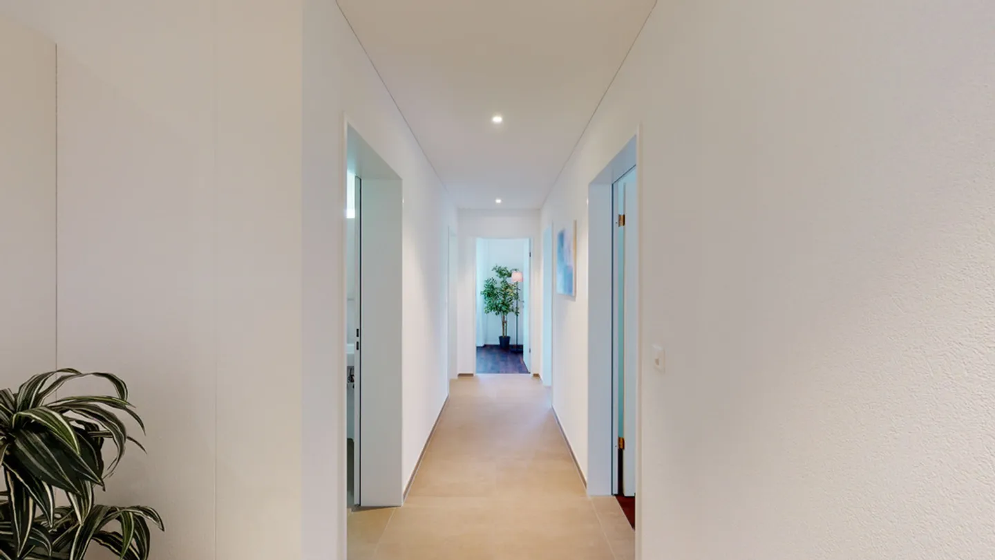 APPARTEMENT MODERNE DE 4,5 PIÈCES DANS UN ENDROIT CALME - Photo 5 sur 9