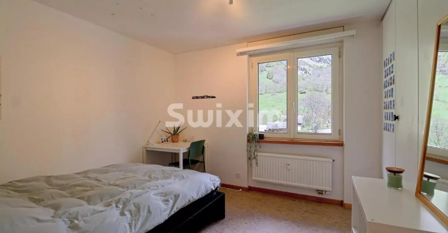 Appartement Charmant avec Vue sur Montagne - Photo 4 sur 8