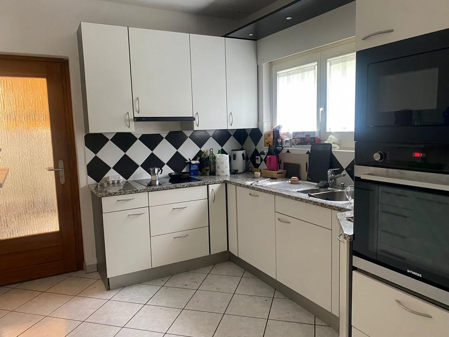 2-family house with 6 1/2 and 2 1/2 room apartments - Photo 8 of 17