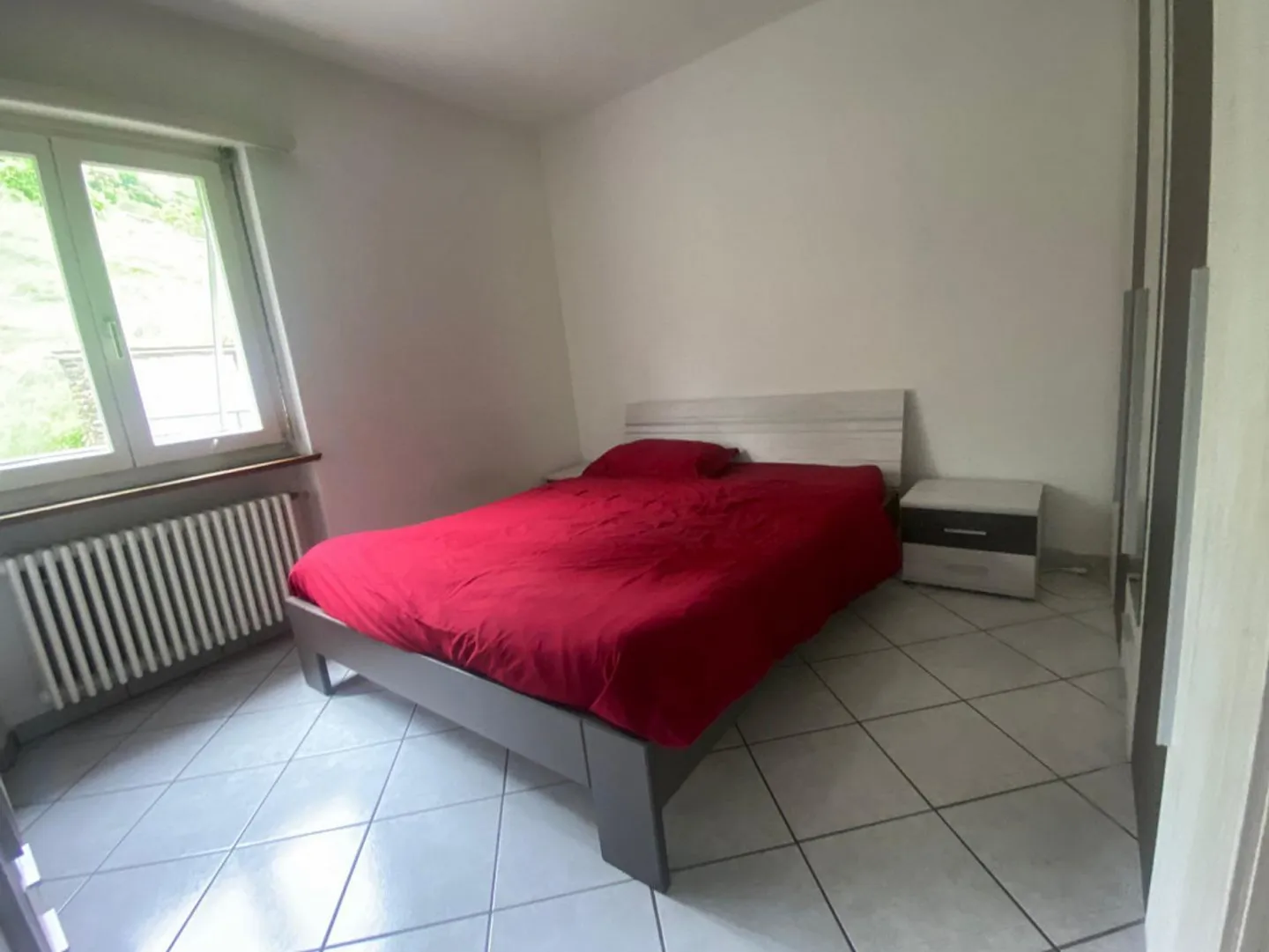 2-family house with 6 1/2 and 2 1/2 room apartments - Photo 10 of 17