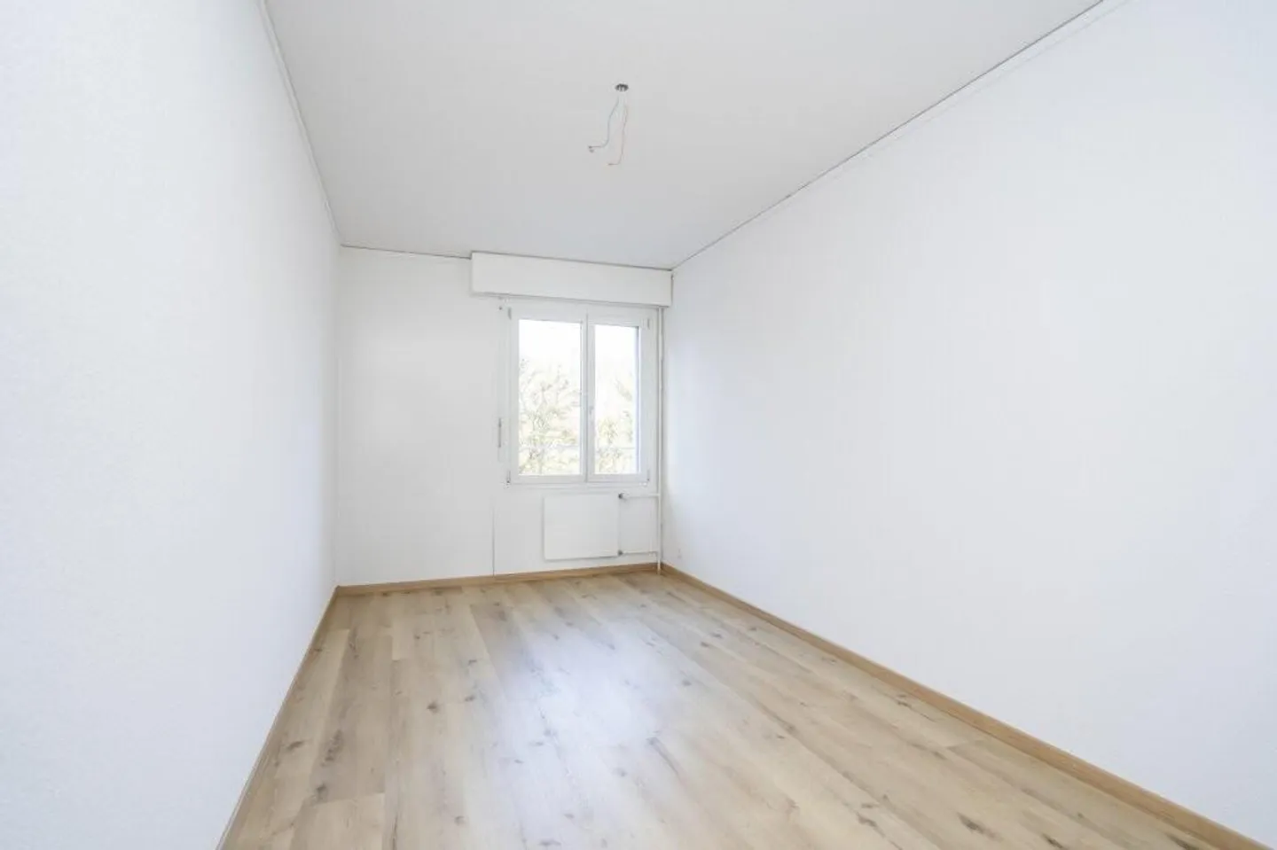 Votre Nouveau Foyer : Appartement 3.5 Pièces Presque Neuf Près du Centre ! - Photo 7 sur 9