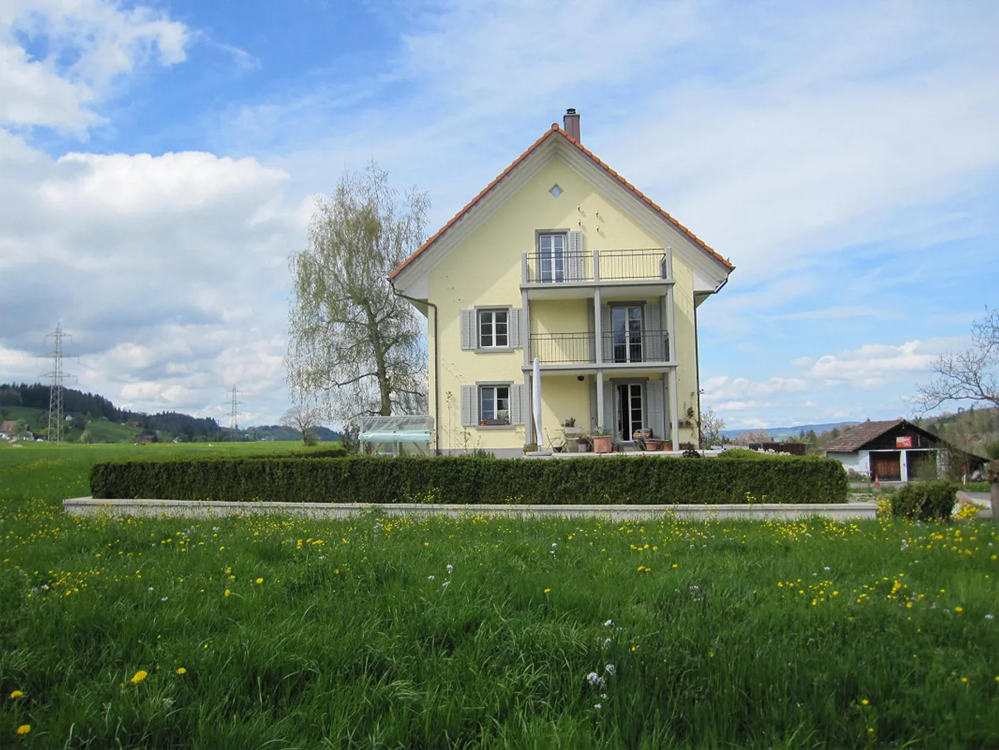 Appartamento 2 1/2 locali con balcone in un contesto rurale non edificabile - Foto 1 di 14