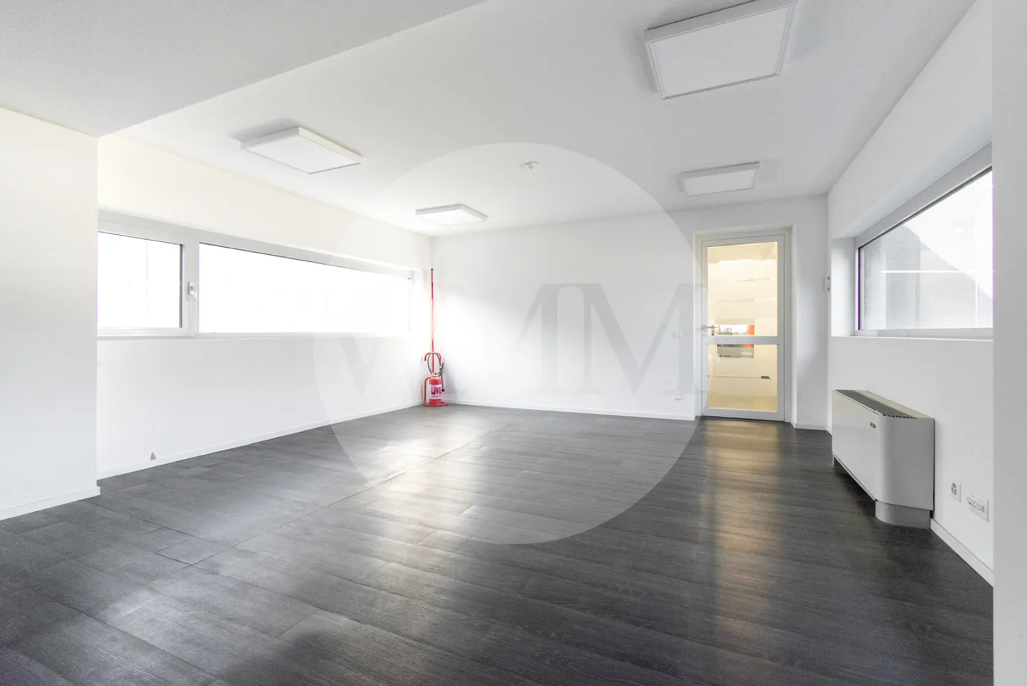 BRIGHT OPEN SPACE IN STRATEGIC LOCATION - Photo 2 of 11