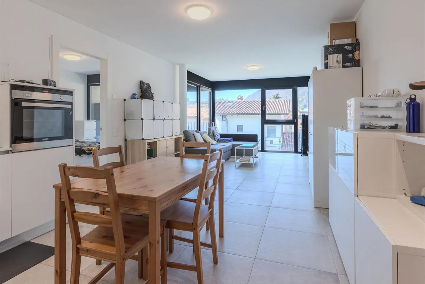 Geräumige und moderne 2.5-Zimmer-Wohnung mit Terrasse in Agno - Foto 1 von 9