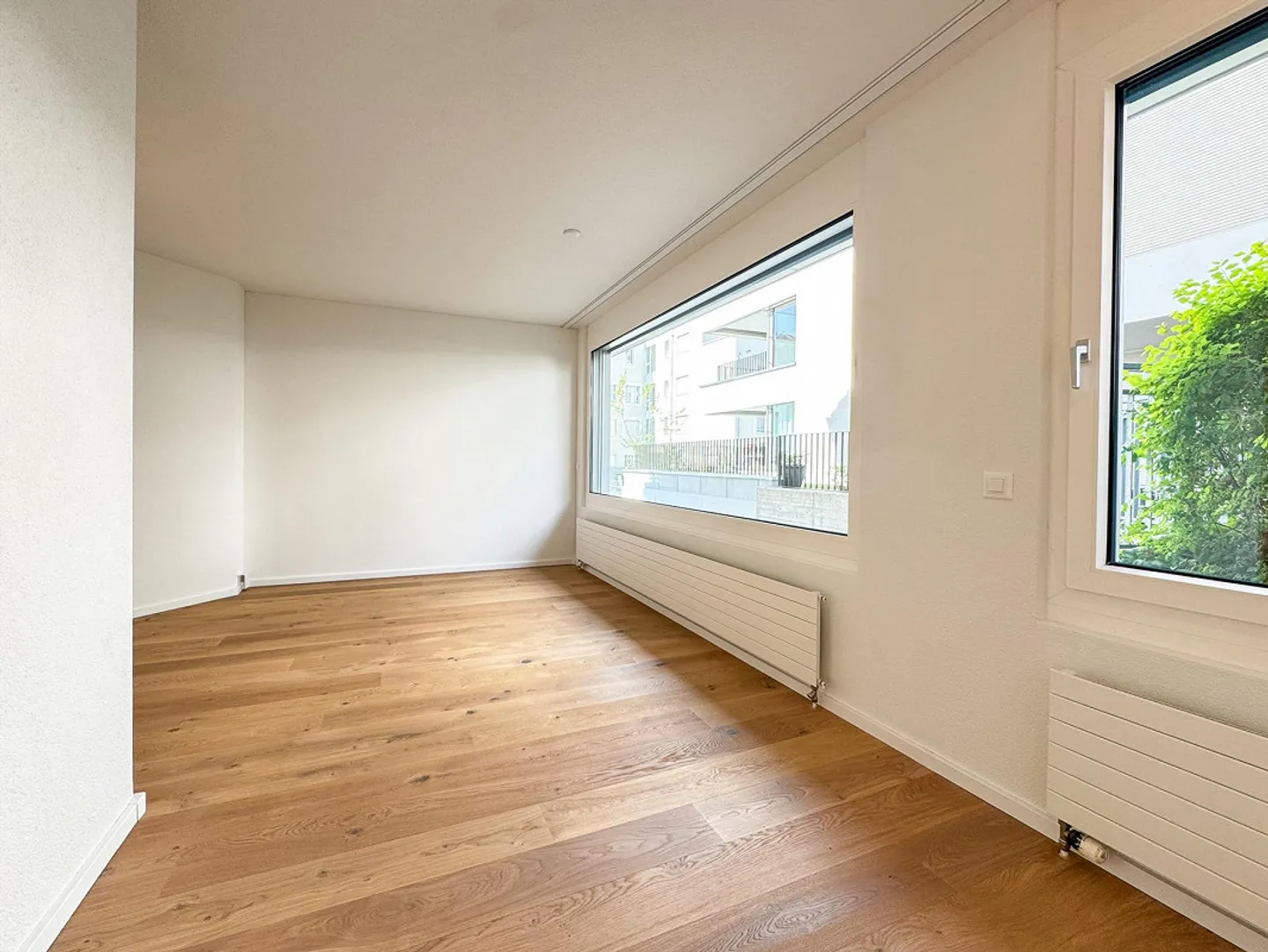 Appartamento giardino moderno 3½ locali in posizione centrale - Foto 4 di 7