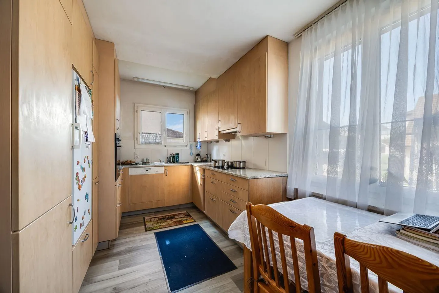 Petit beau immeuble multifamilial avec trois appartements loués - Photo 4 sur 13