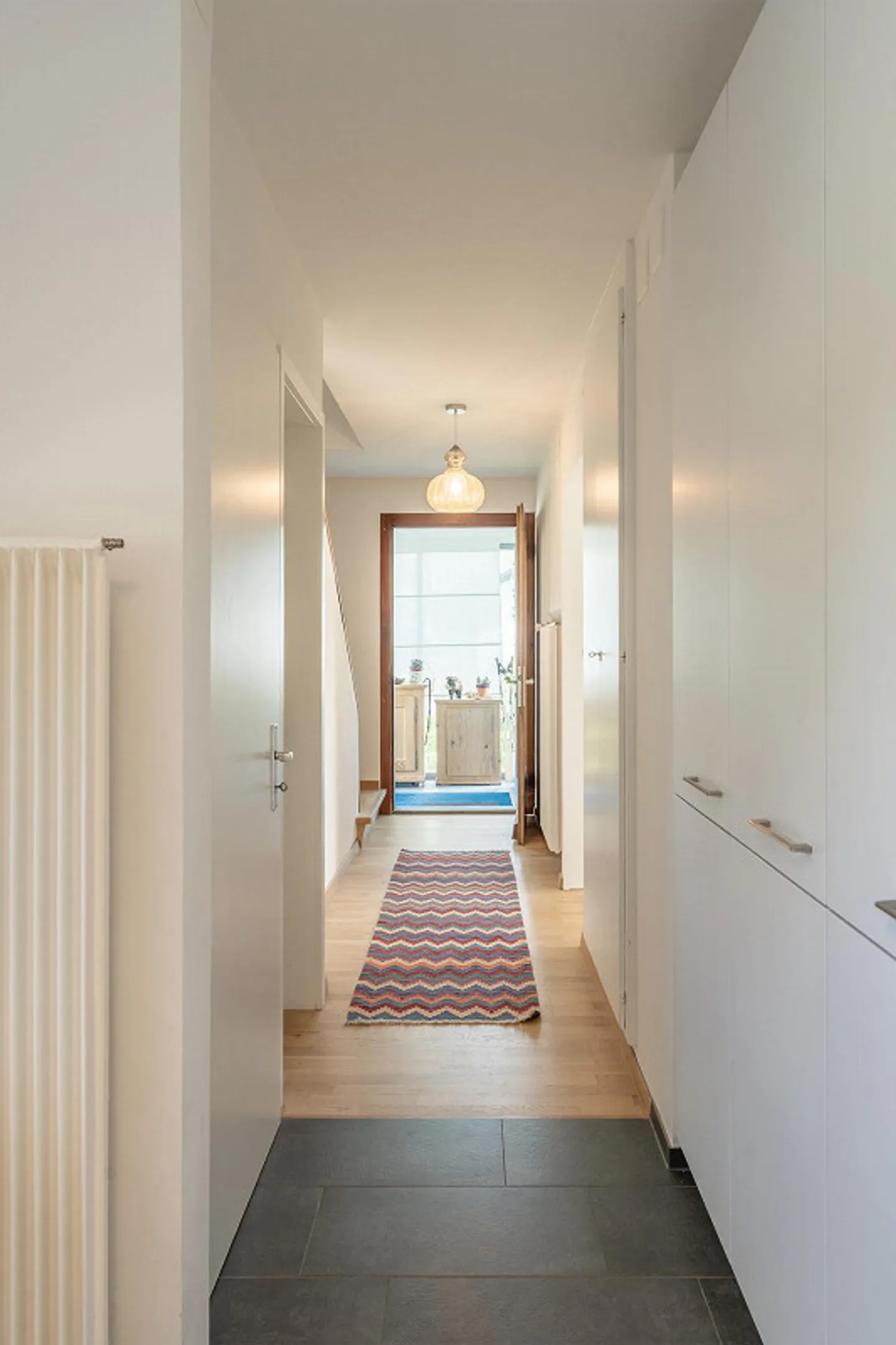 Incantevole casa bifamiliare di 3,5 locali con grande oasi giardino - Foto 7 di 15