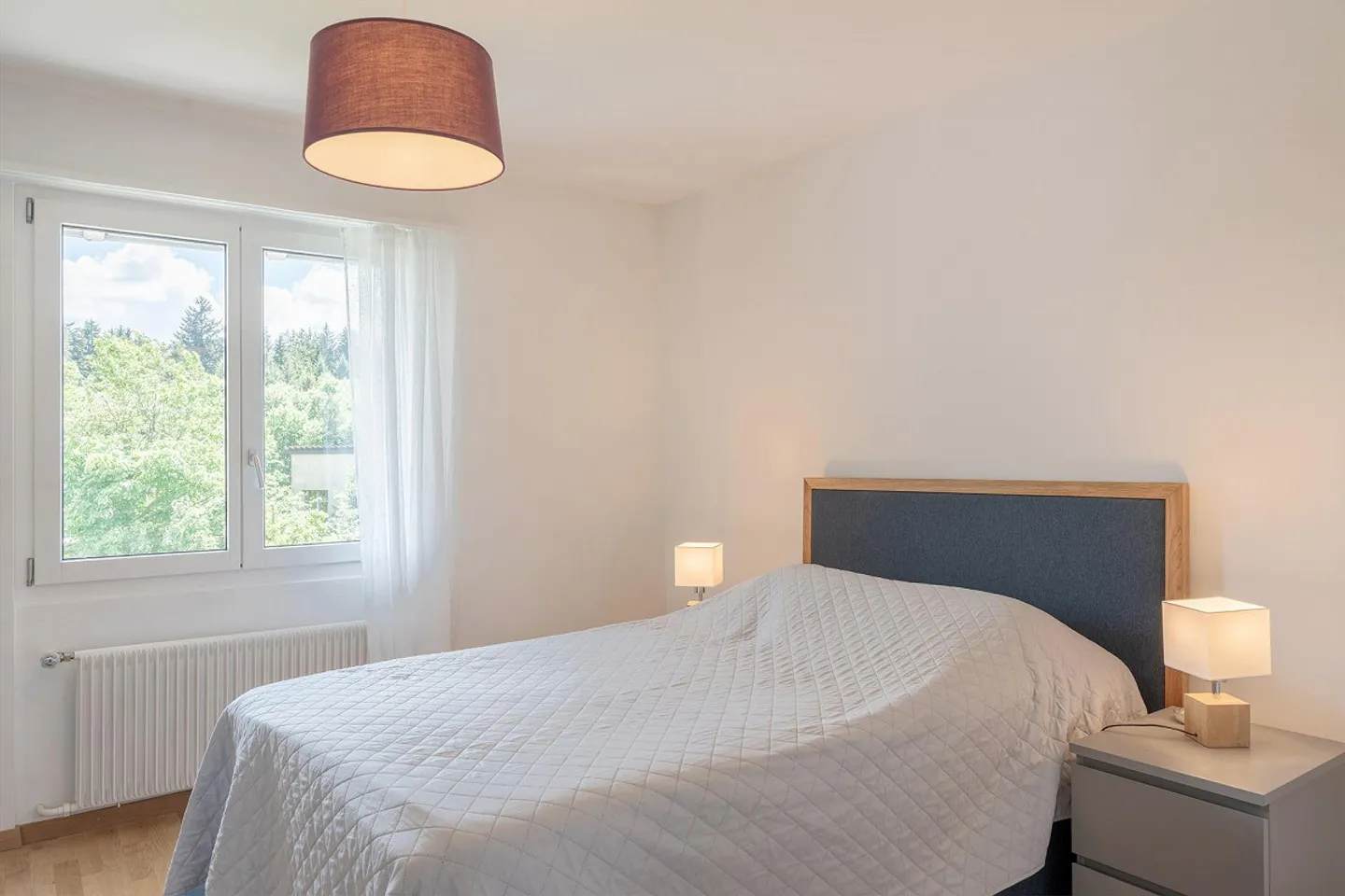 Incantevole casa bifamiliare di 3,5 locali con grande oasi giardino - Foto 13 di 15
