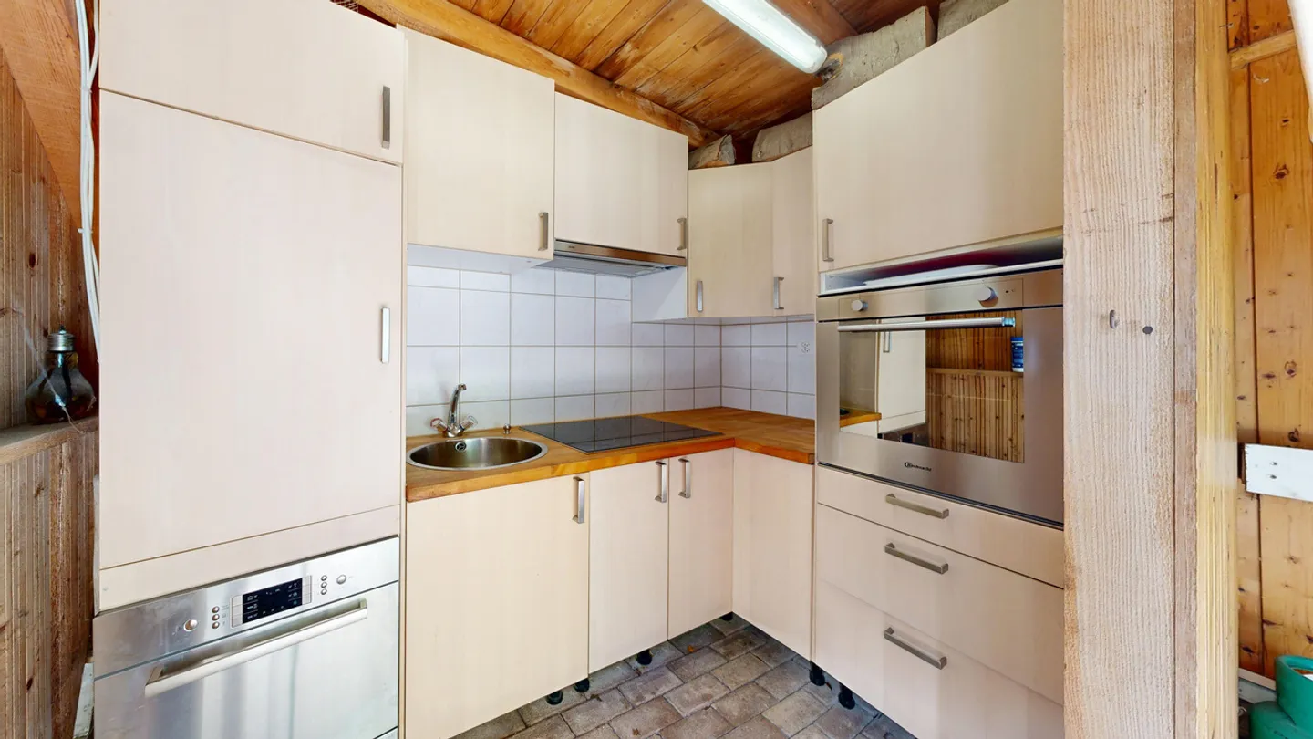 Appartement en duplex spacieux de 4,5 pièces avec jardin et deux places de parking - Photo 20 sur 21