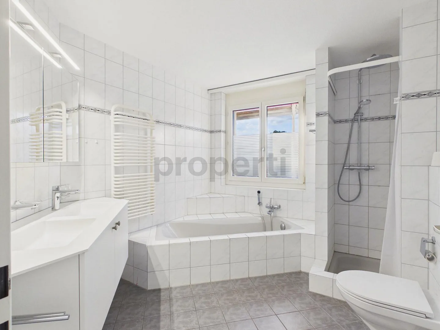 Appartement rénové avec jardin - Photo 8 sur 13