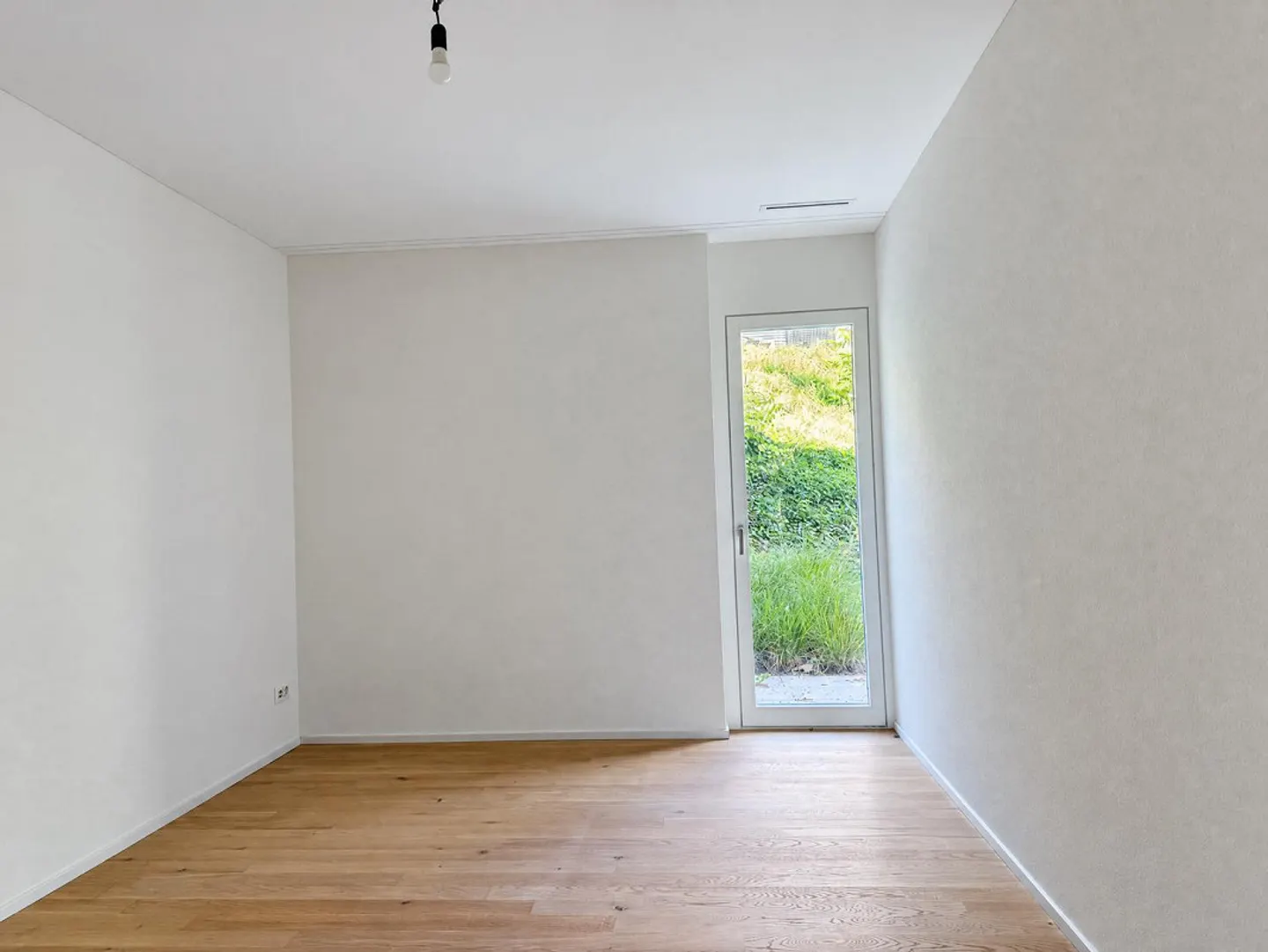 Moderno appartamento al piano terra di 3,5 locali con patio - Foto 10 di 12