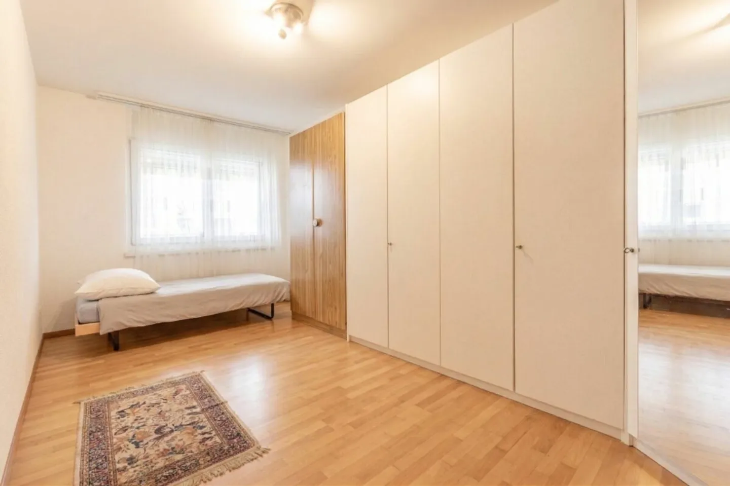 Appartamento di 4,5 stanze con due posti auto in garage sotterraneo e un laboratorio privato - Foto 7 di 17