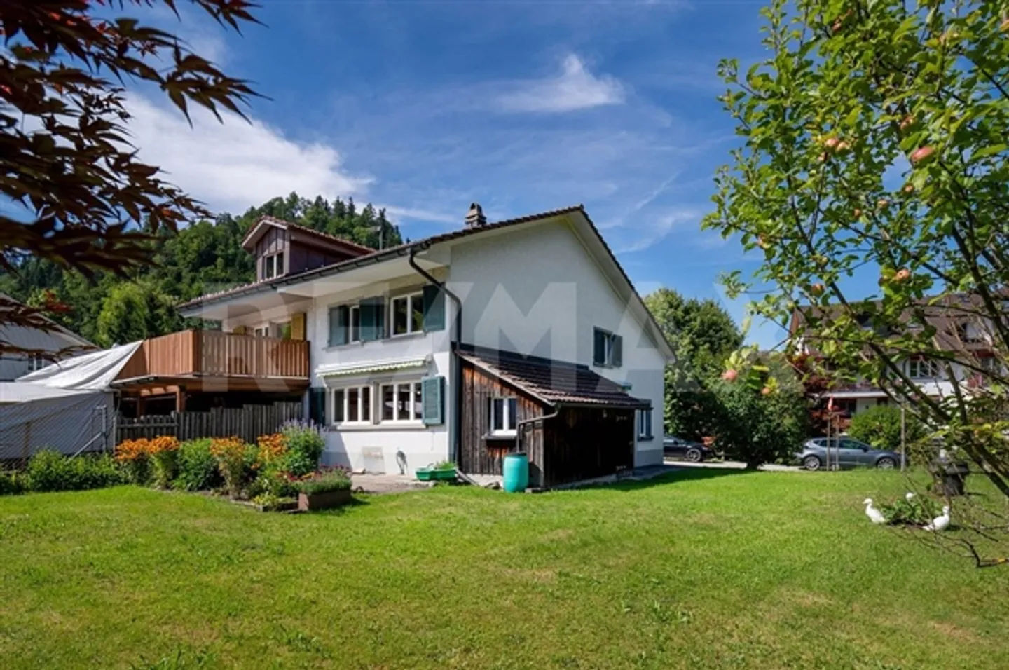 Well-maintained duplex house with building plot - Photo 1 of 13