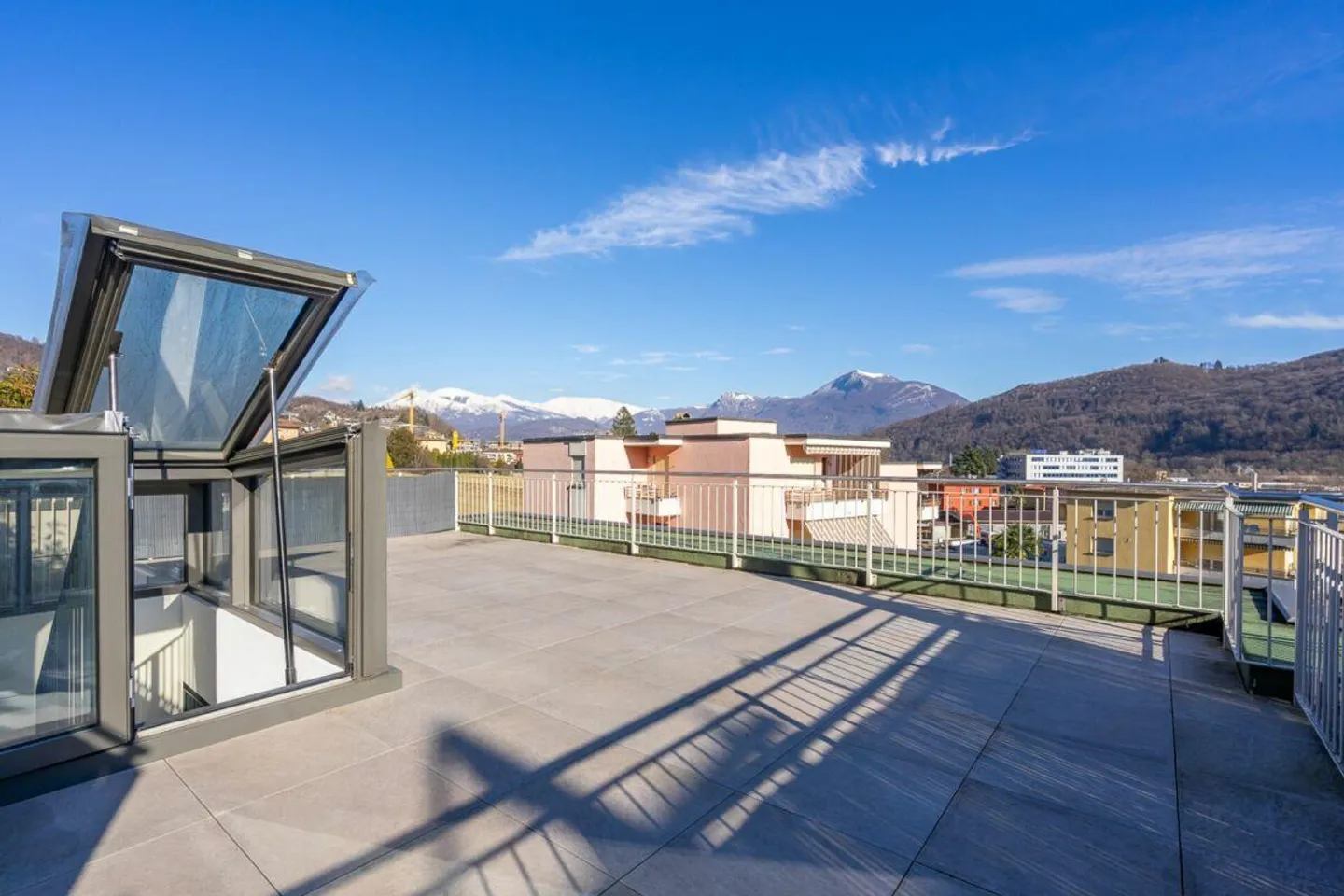 AGNO · 2.5 DESIGN ROOMS WITH PANORAMIC ROOFTOP - Photo 9 of 11