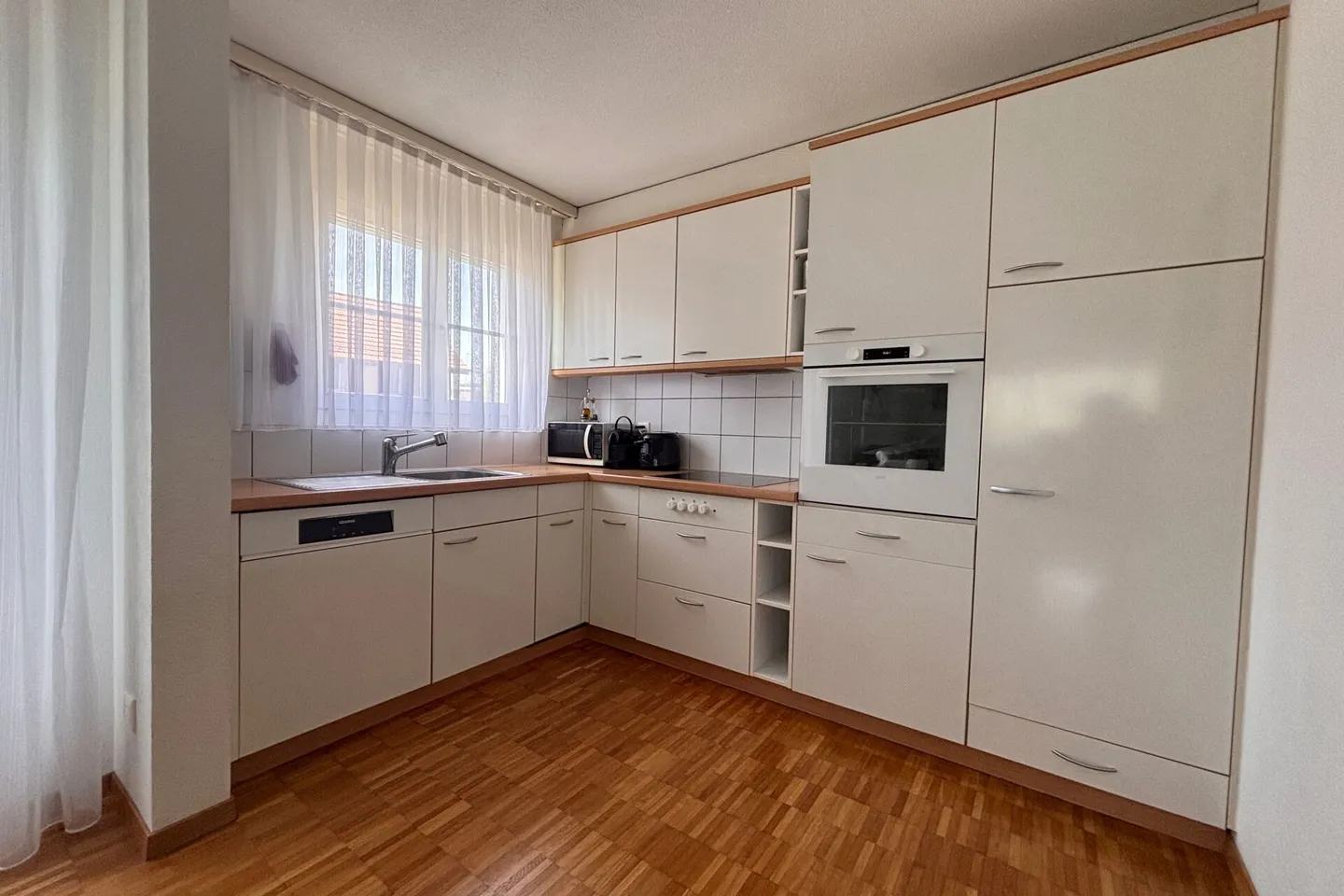 Zentral gelegene Erdgeschosswohnung mit Garten - Foto 4 von 13