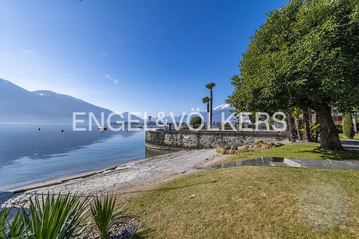 Résidence au bord du lac avec plage privée (14) - Photo 8 sur 10